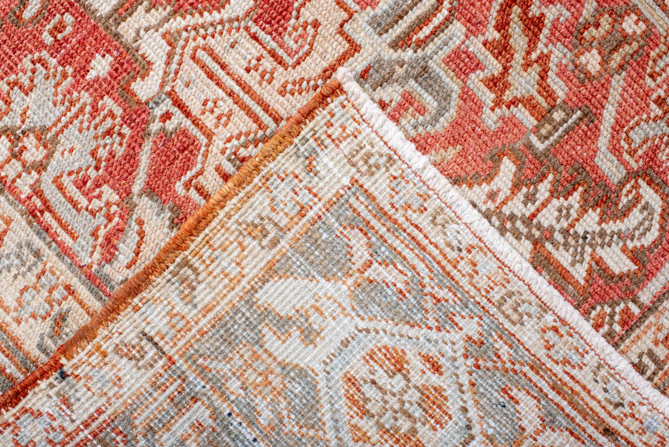 5' x 7' one-of-a-kind handmade vintage Heriz rug. Color palette: coral, ivory, taupe, terra cotta, camel, sage, terracotta