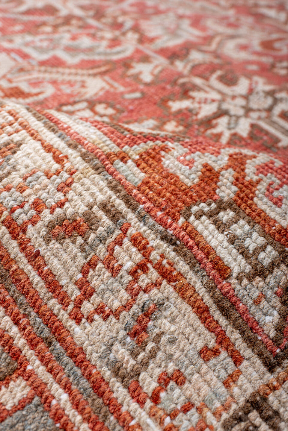 5' x 7' one-of-a-kind handmade vintage Heriz rug. Color palette: coral, ivory, taupe, terra cotta, camel, sage, terracotta
