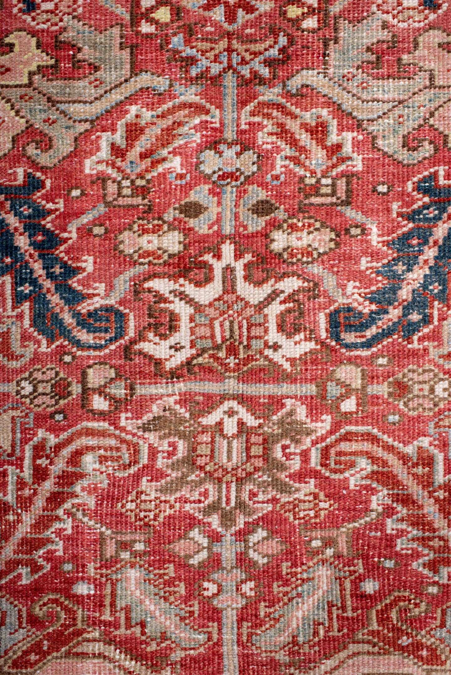 6' x 8' one-of-a-kind handmade antique Heriz medium size rug. Color palette: terra cotta, ivory, navy, soft blue, rust