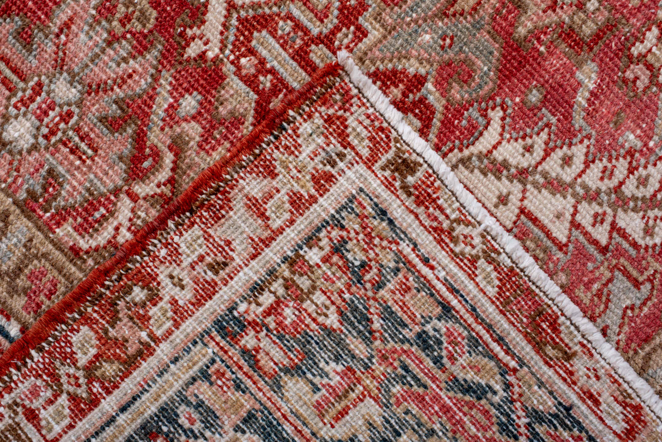 6' x 8' one-of-a-kind handmade antique Heriz medium size rug. Color palette: terra cotta, ivory, navy, soft blue, rust