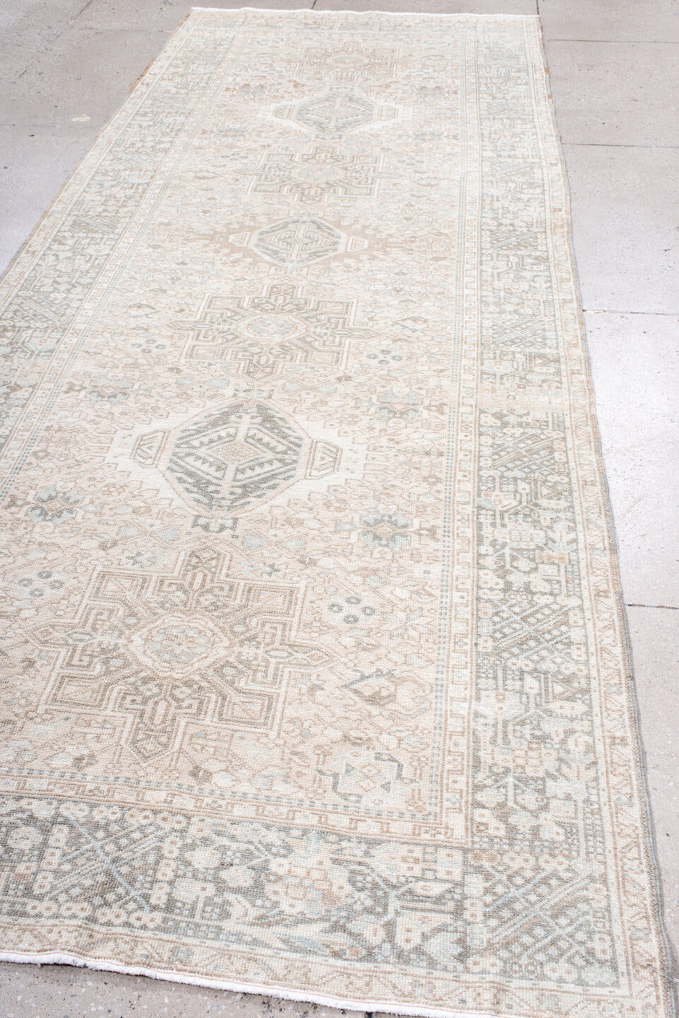 4' x 12' one-of-a-kind handmade antique Karaje runner rug. Color palette: ivory, taupe, pale blue, beige, camel, soft gray