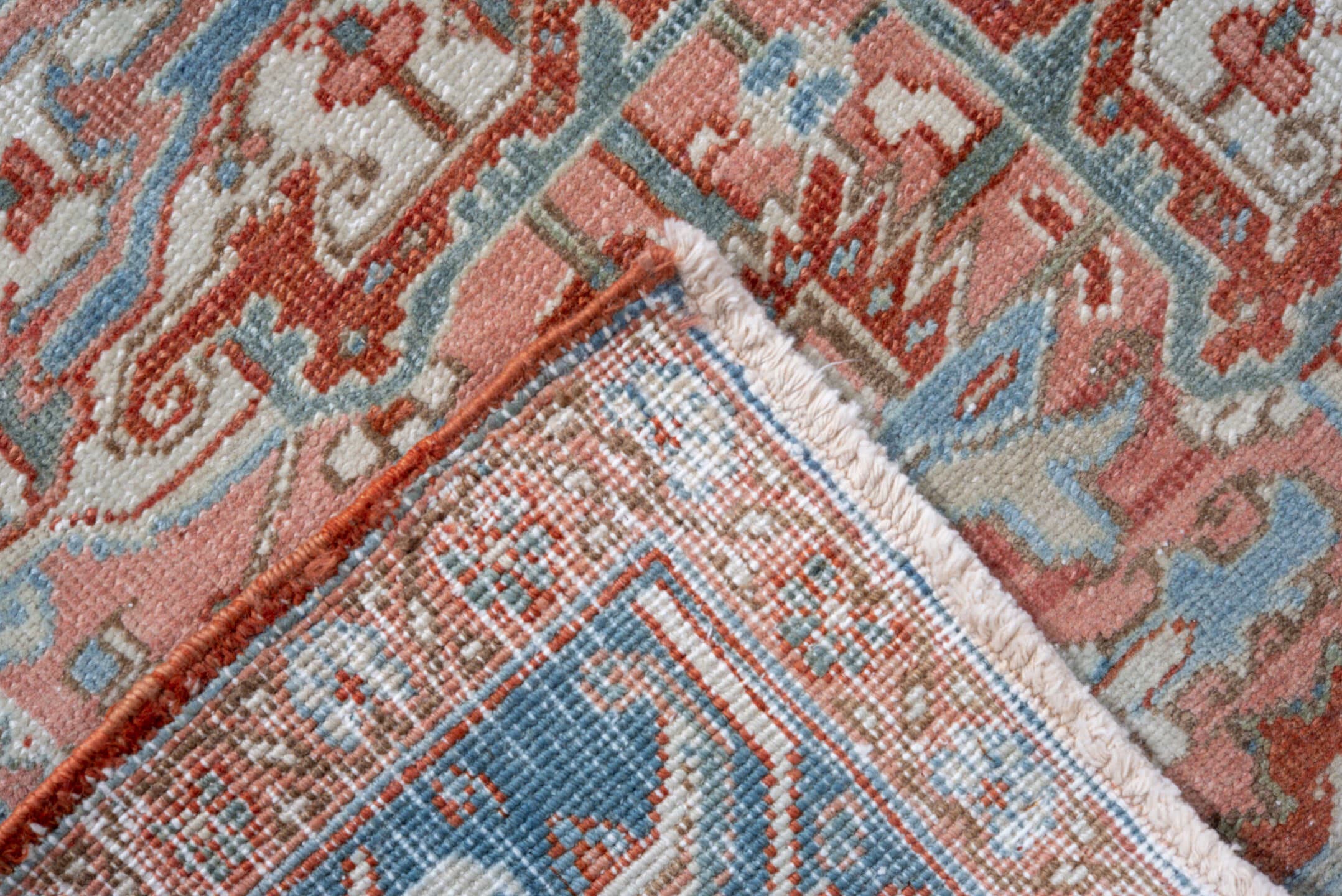7' x 11' one-of-a-kind handmade vintage Heriz large size rug. Color palette: terra cotta, powder blue, ivory, rust, sky blue