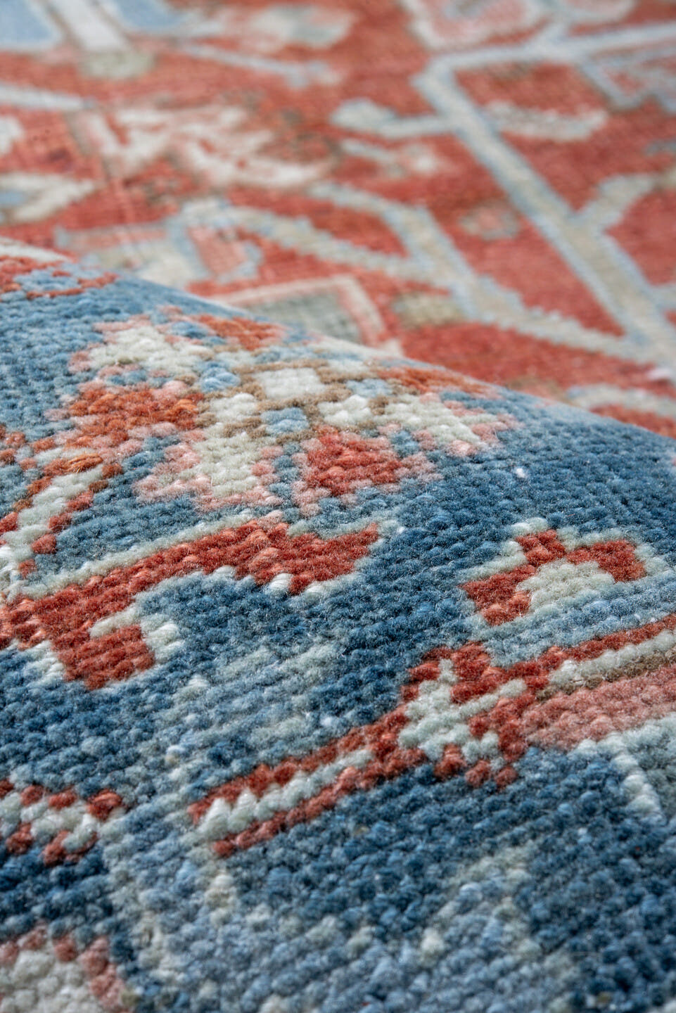 7' x 11' one-of-a-kind handmade vintage Heriz large size rug. Color palette: terra cotta, powder blue, ivory, rust, sky blue
