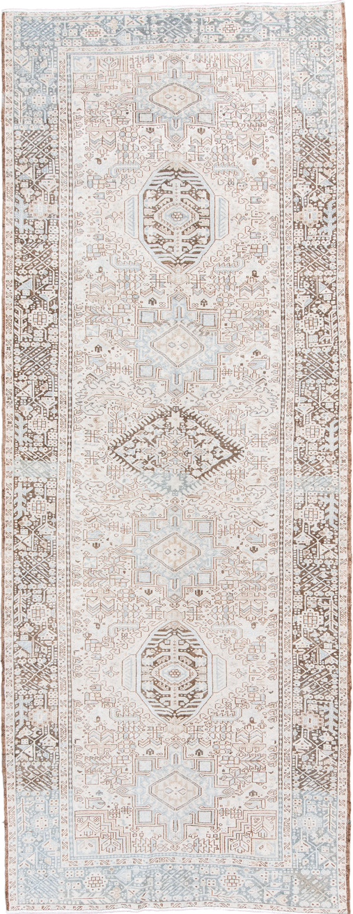 5' x 12' one-of-a-kind handmade antique Karaje runner rug. Color palette: ivory, pale blue, taupe, camel, light brown