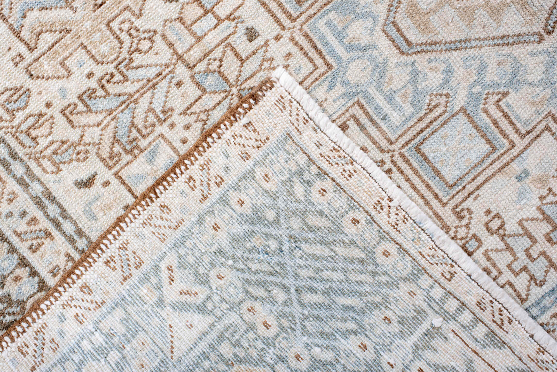 5' x 12' one-of-a-kind handmade antique Karaje runner rug. Color palette: ivory, pale blue, taupe, camel, light brown