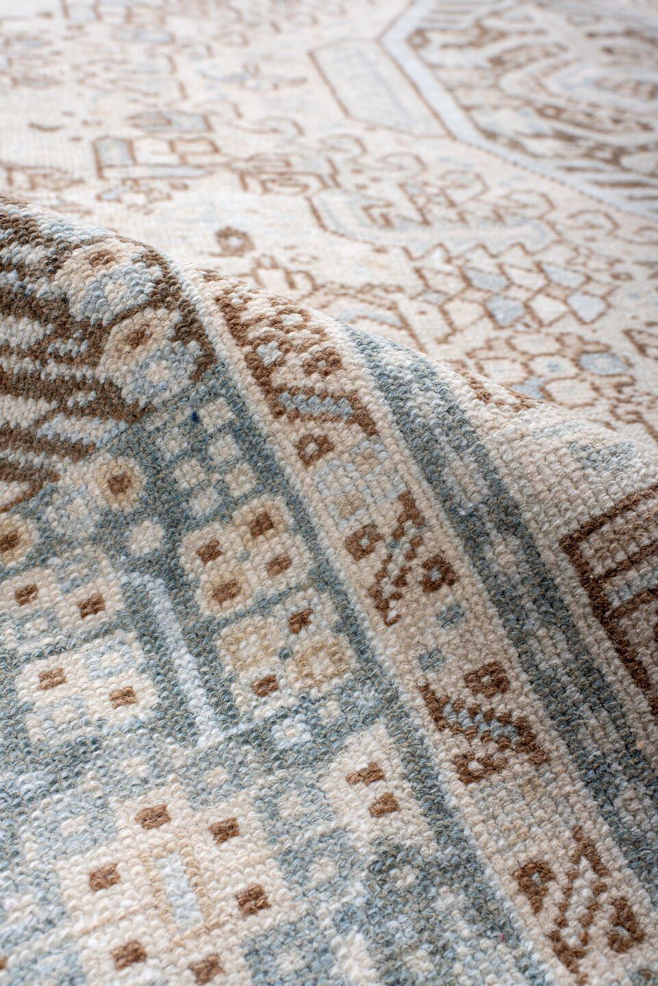 5' x 12' one-of-a-kind handmade antique Karaje runner rug. Color palette: ivory, pale blue, taupe, camel, light brown