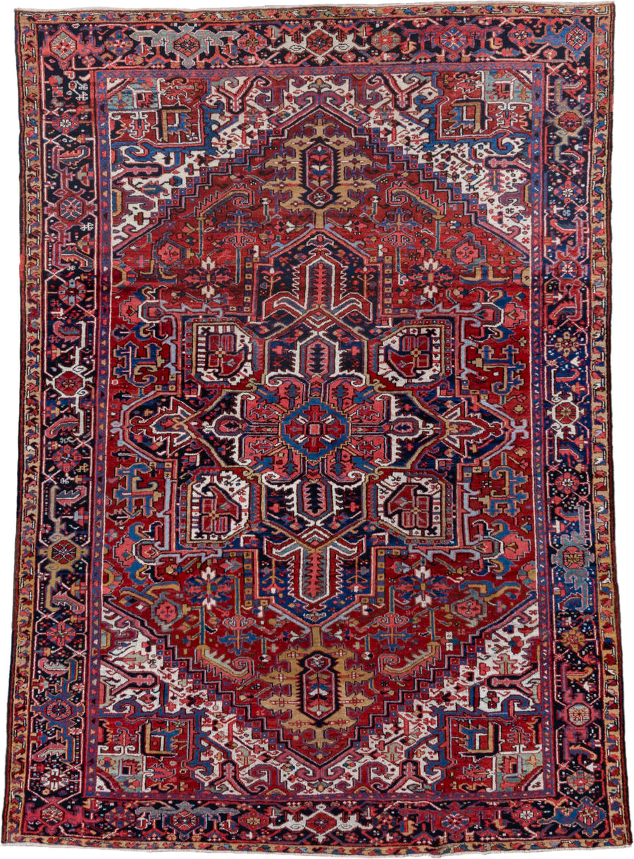 7' x 10' one-of-a-kind handmade vintage Heriz large size rug. Color palette: rust, navy, ivory, crimson, cobalt, camel, rose