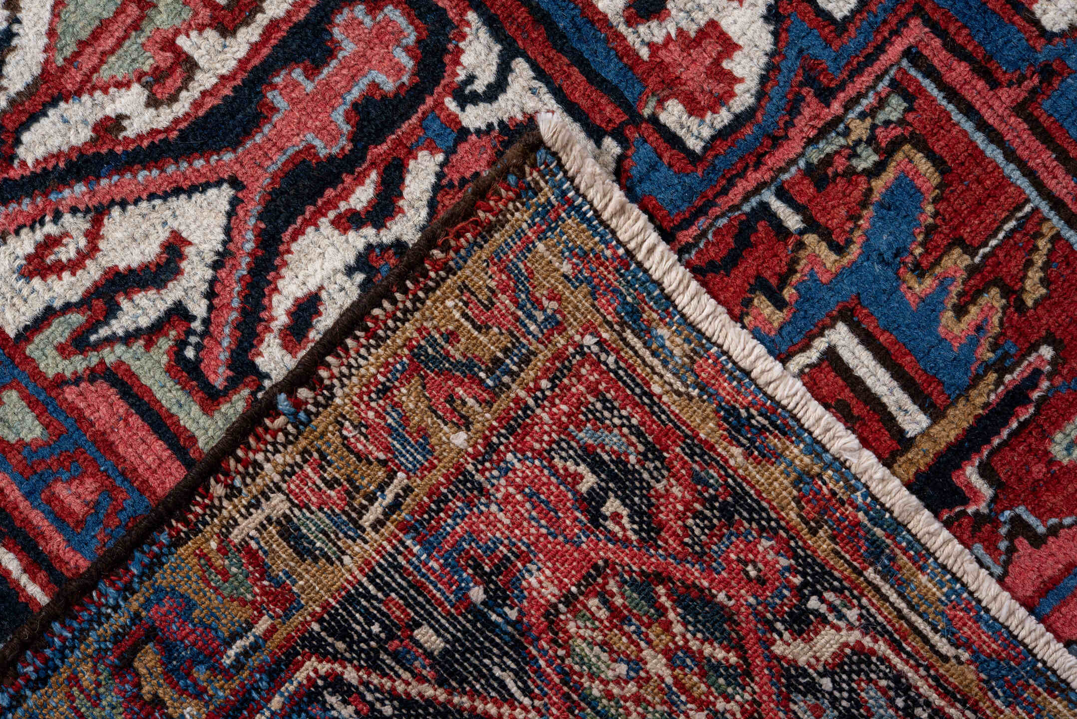 7' x 10' one-of-a-kind handmade vintage Heriz large size rug. Color palette: rust, navy, ivory, crimson, cobalt, camel, rose
