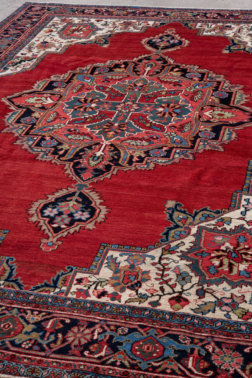 8' x 11' one-of-a-kind handmade vintage Heriz large size rug. Color palette: red, navy, ivory, sky blue, rose, coral