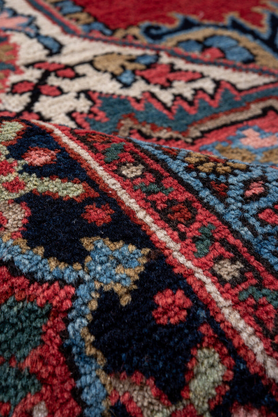 8' x 11' one-of-a-kind handmade vintage Heriz large size rug. Color palette: red, navy, ivory, sky blue, rose, coral