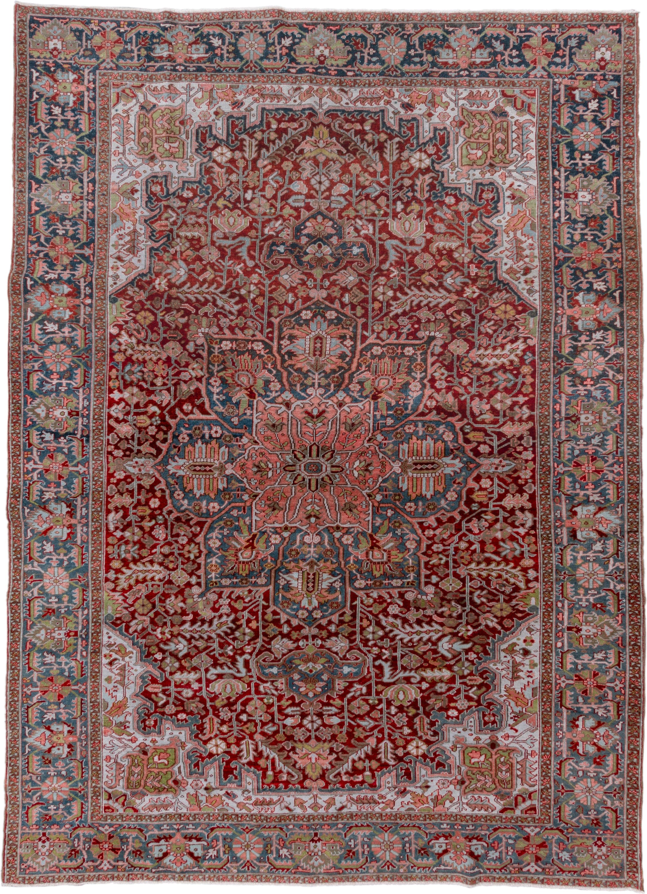 8' x 12' one-of-a-kind handmade vintage Heriz large size rug. Color palette: rust, powder blue, ivory, rose, navy, sage