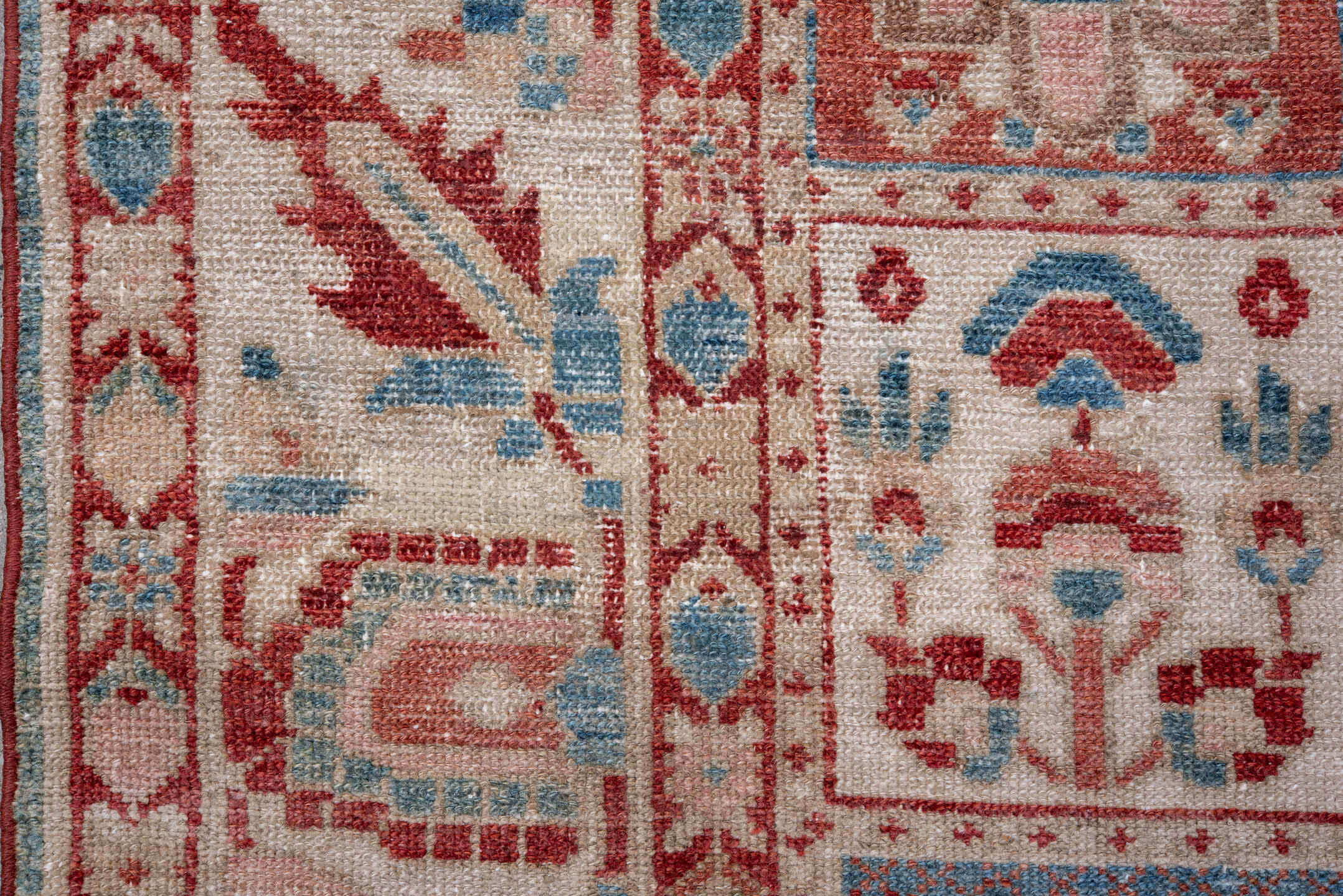 7' x 9' one-of-a-kind handmade vintage Baktiary rug. Color palette: ivory, coral, brick red, sky blue, dusty rose