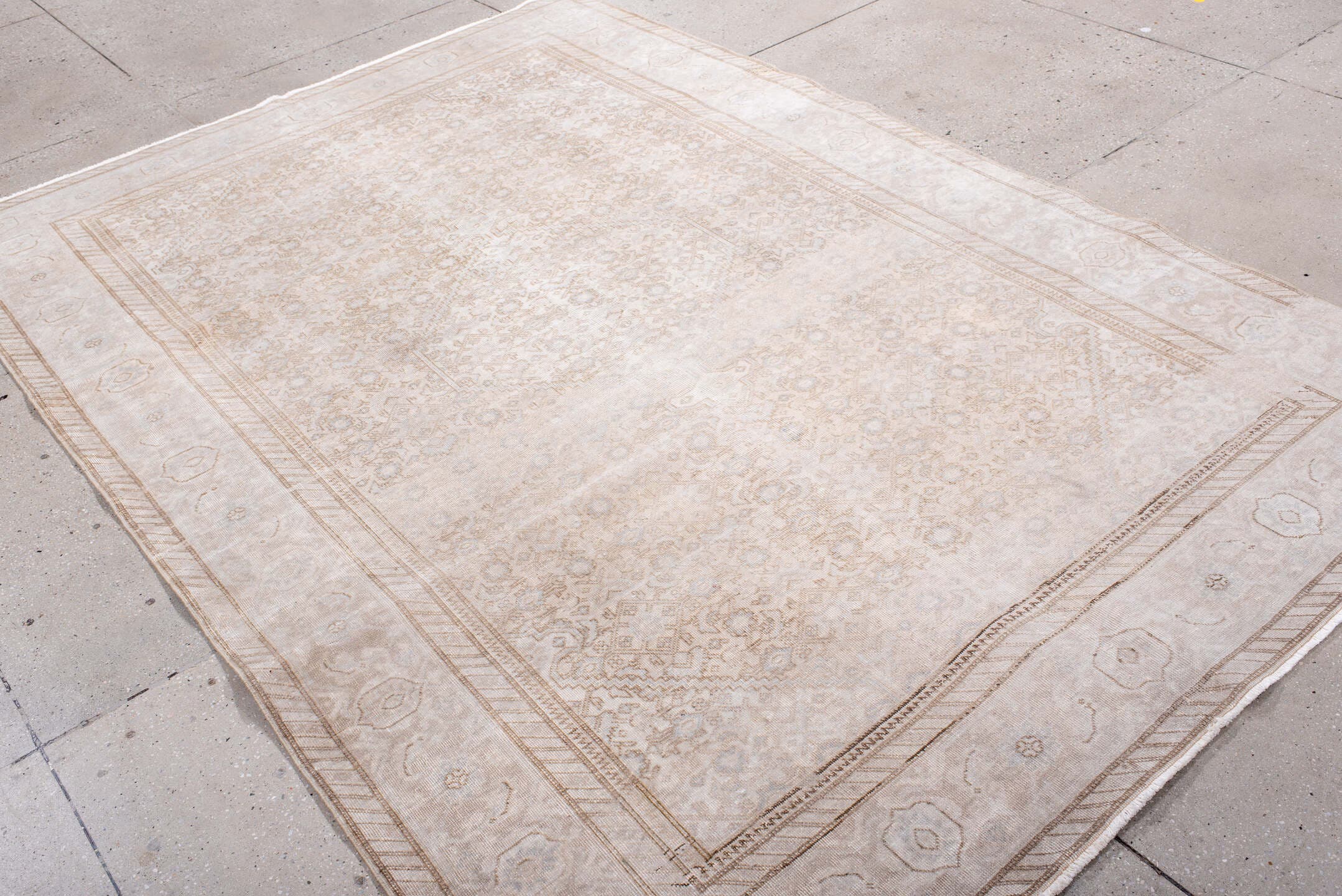 6' x 8' one-of-a-kind handmade antique Tabriz medium size rug. Color palette: ivory, beige, taupe, camel, cream, gray