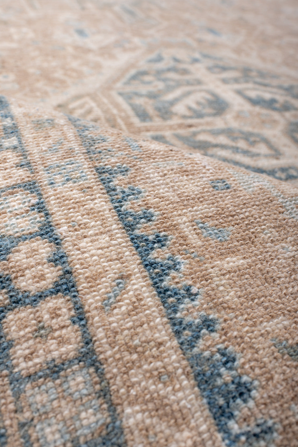 4' x 6' one-of-a-kind handmade antique Karaje rug. Color palette: camel, powder_blue, ivory, taupe, slate, beige, light blue