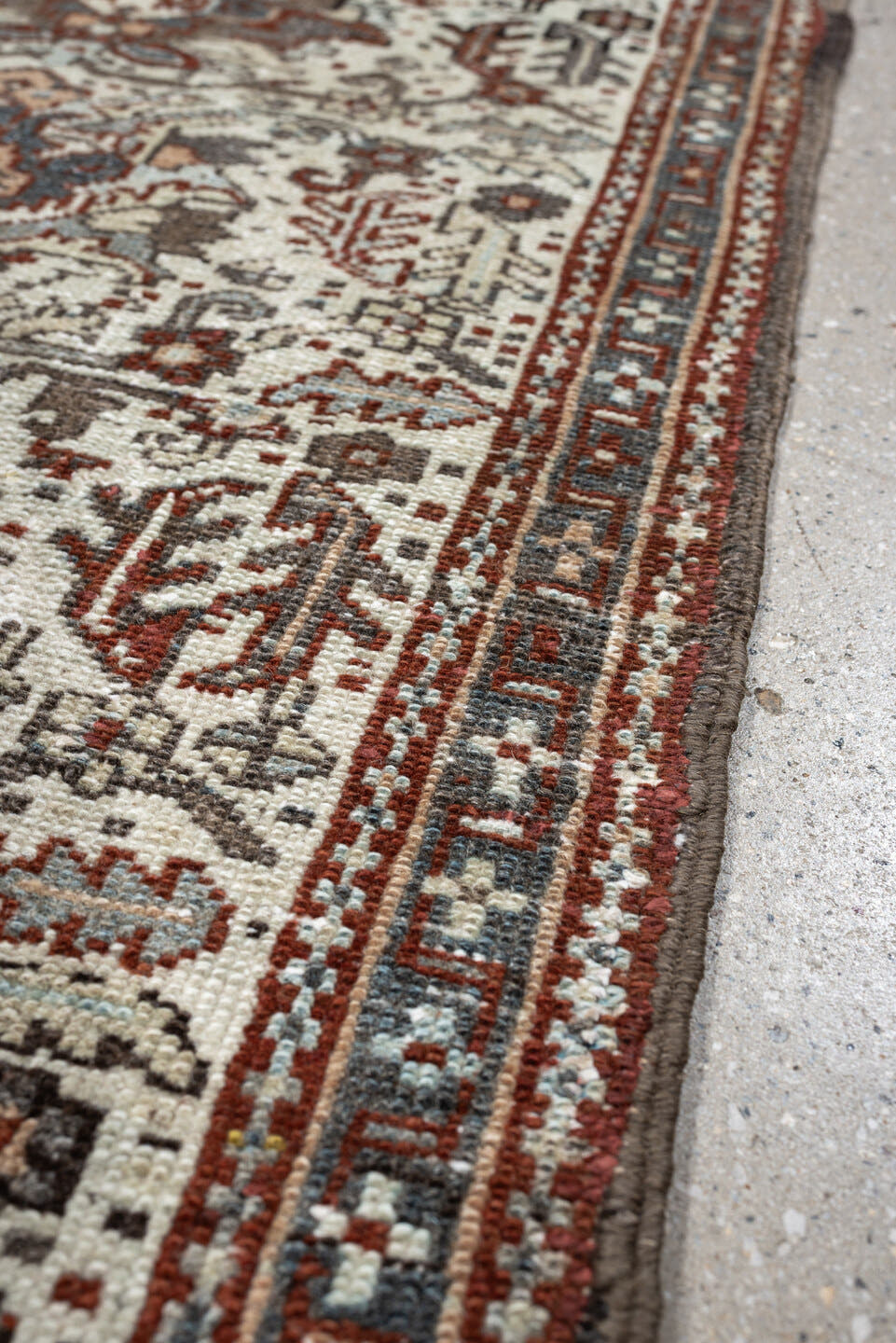 2' x 3' one-of-a-kind handmade antique Karaje small size rug. Color palette: ivory, rust, slate blue, taupe, deep brown