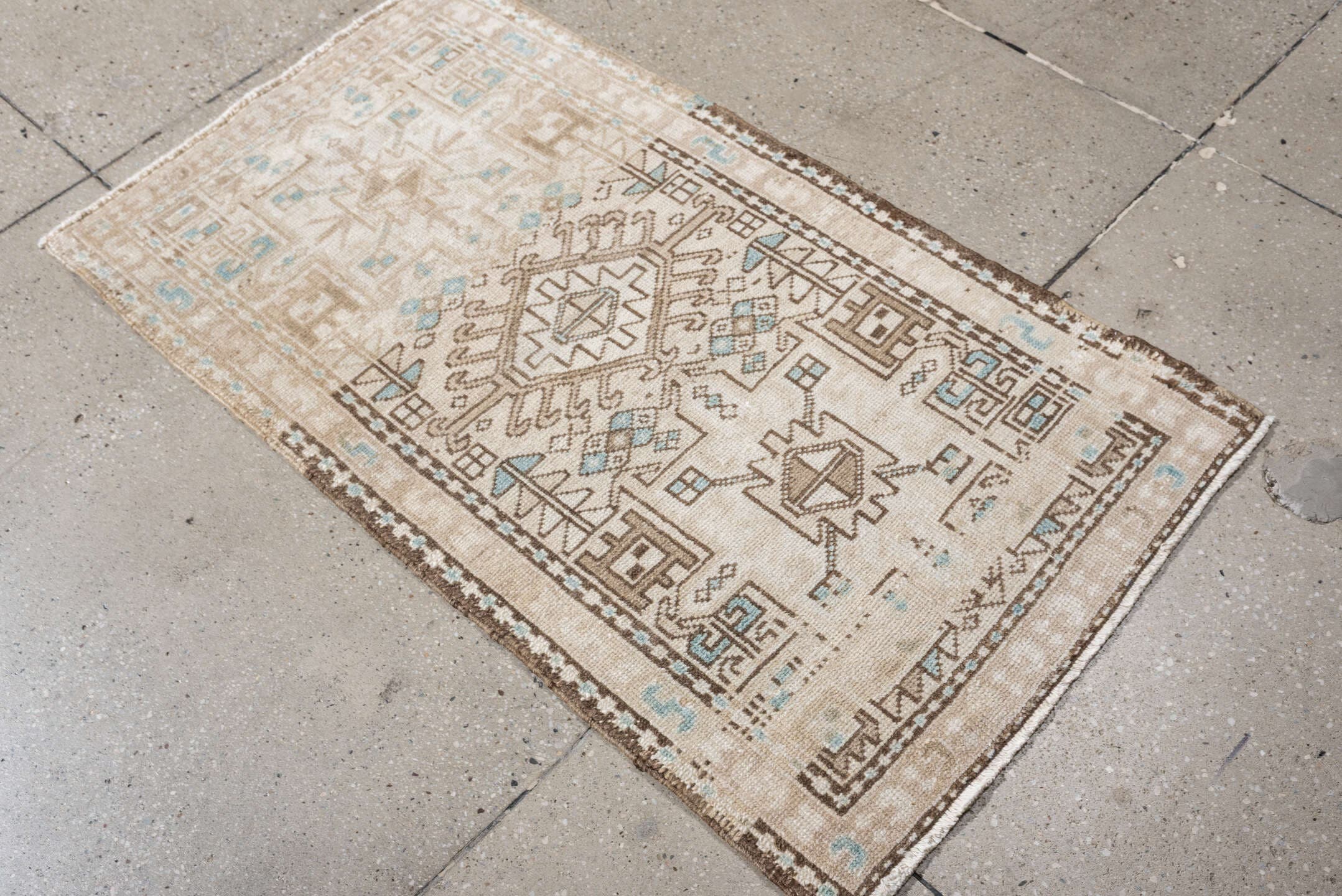 2' x 4' one-of-a-kind handmade antique Karaje small size rug. Color palette: ivory, sand, light aqua, taupe, brown, beige