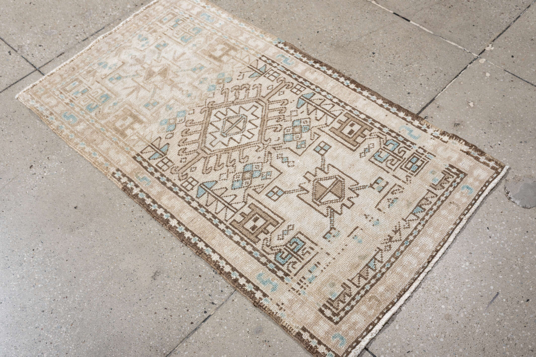 2' x 4' one-of-a-kind handmade antique Karaje small size rug. Color palette: ivory, sand, light aqua, taupe, brown, beige