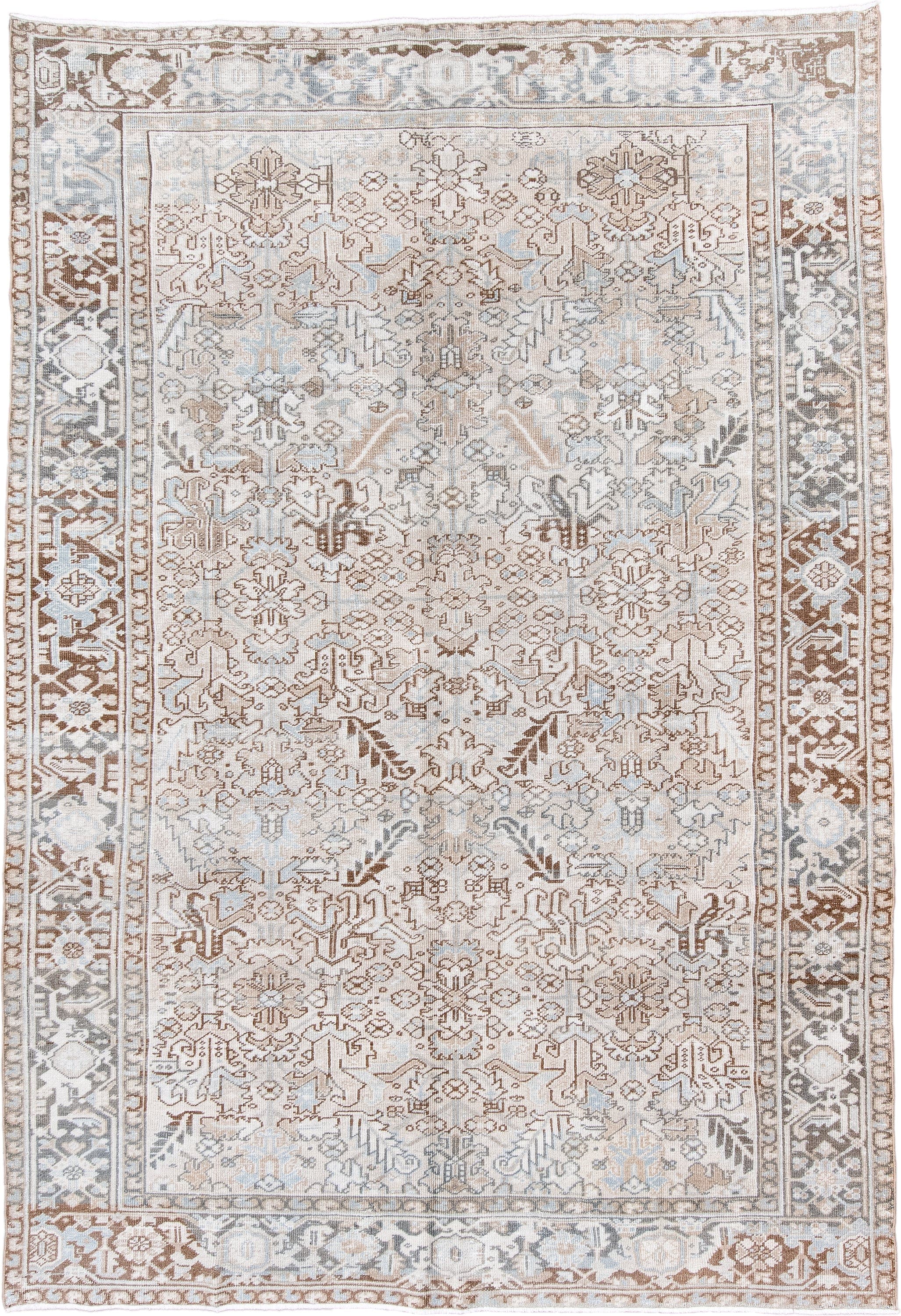 7' x 11' one-of-a-kind handmade antique Heriz large size rug. Color palette: ivory, taupe, light blue, camel, brown, cream