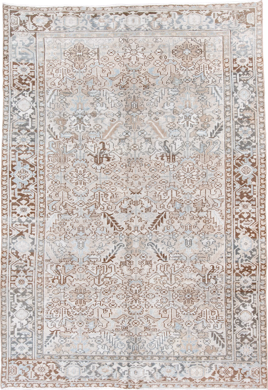 7' x 11' one-of-a-kind handmade antique Heriz large size rug. Color palette: ivory, taupe, light blue, camel, brown, cream