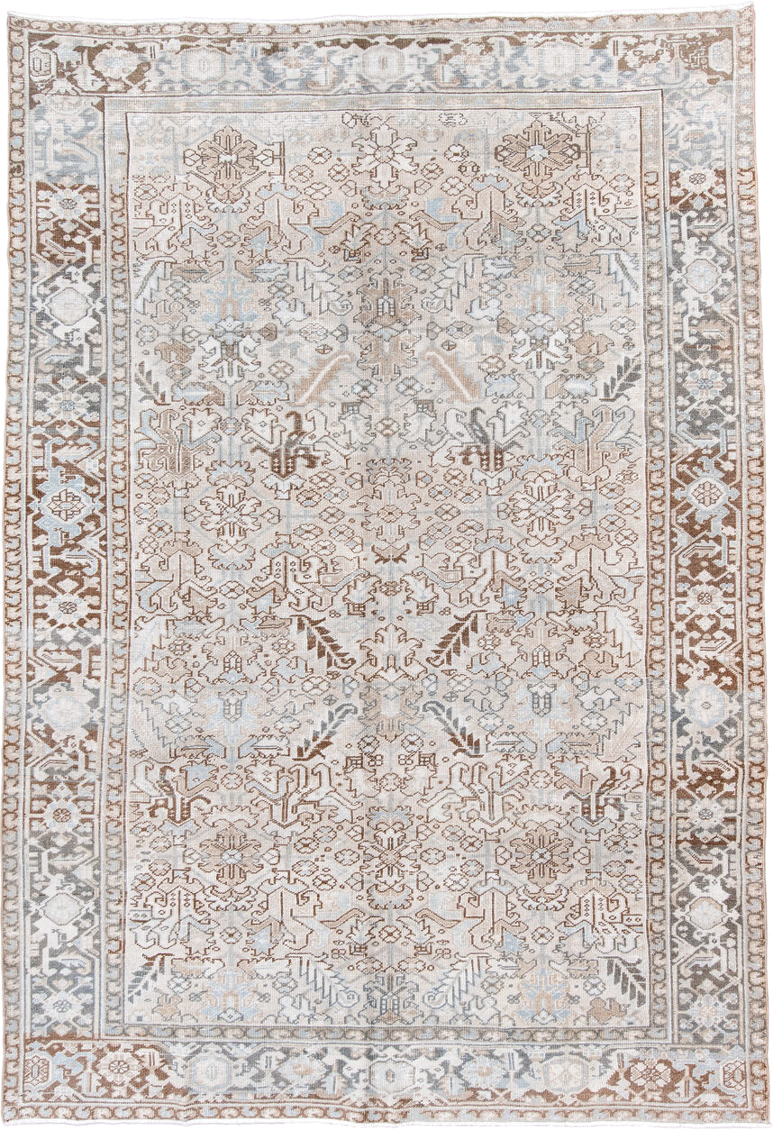 7' x 11' one-of-a-kind handmade antique Heriz large size rug. Color palette: ivory, taupe, light blue, camel, brown, cream