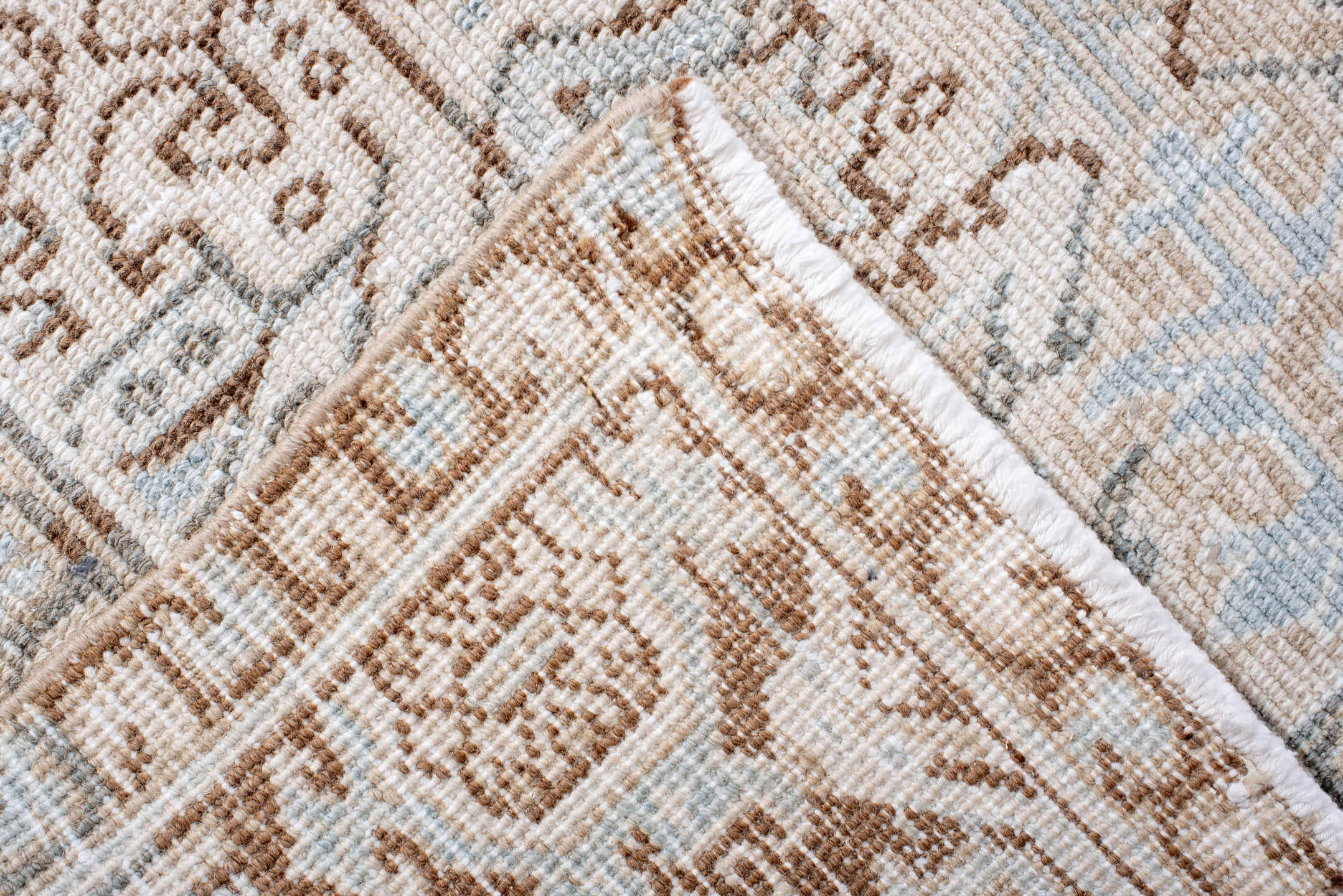 7' x 11' one-of-a-kind handmade antique Heriz large size rug. Color palette: ivory, taupe, light blue, camel, brown, cream