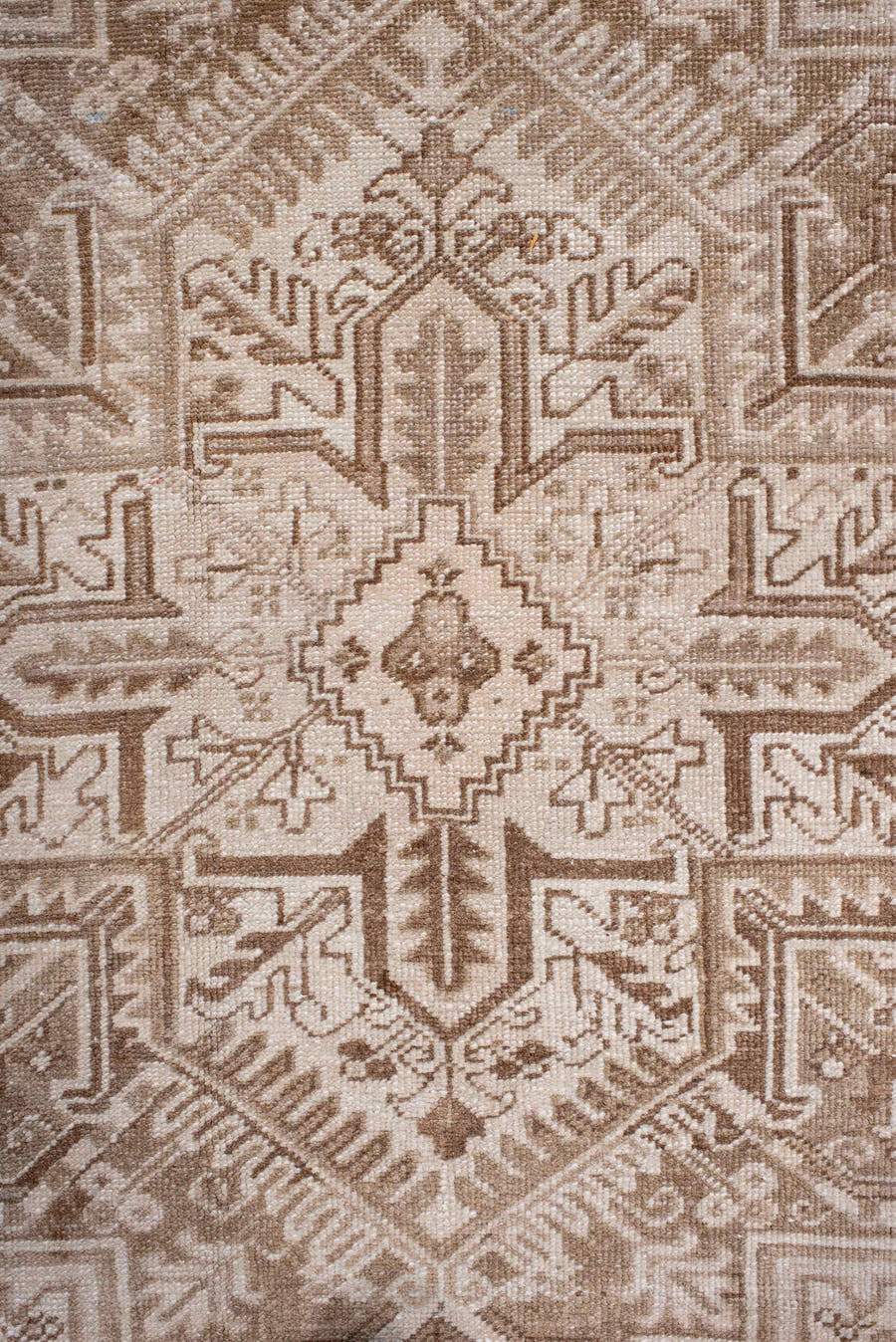 7' x 9' one-of-a-kind handmade antique Heriz rug. Color palette: ivory, camel, taupe, beige, sand, gray