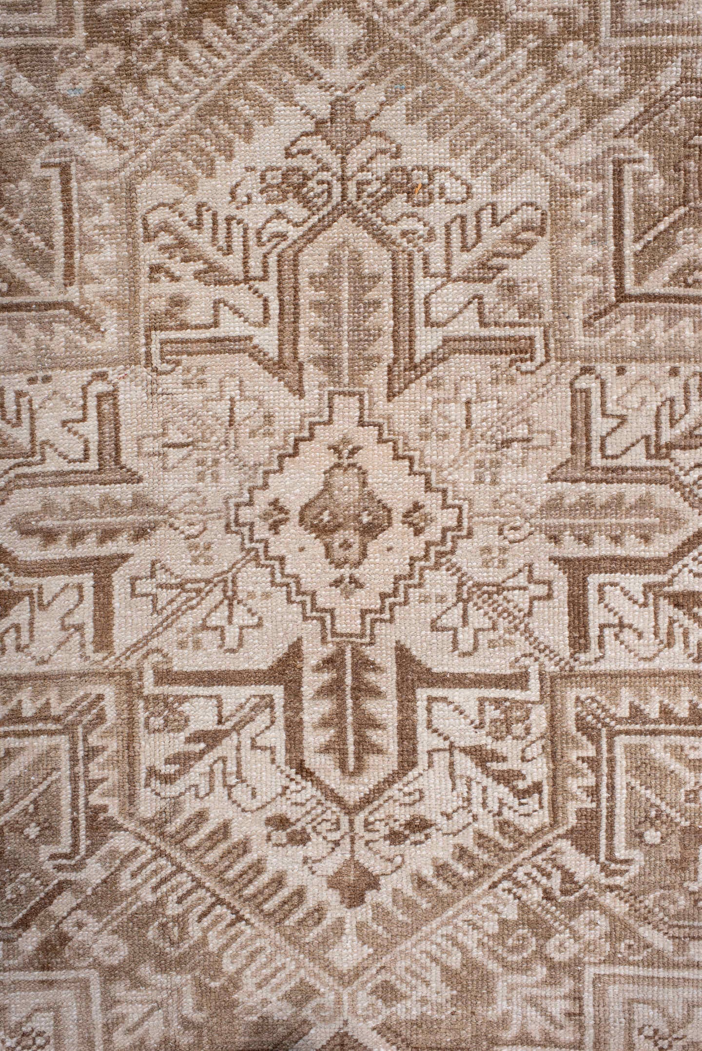 7' x 9' one-of-a-kind handmade antique Heriz rug. Color palette: ivory, camel, taupe, beige, sand, gray