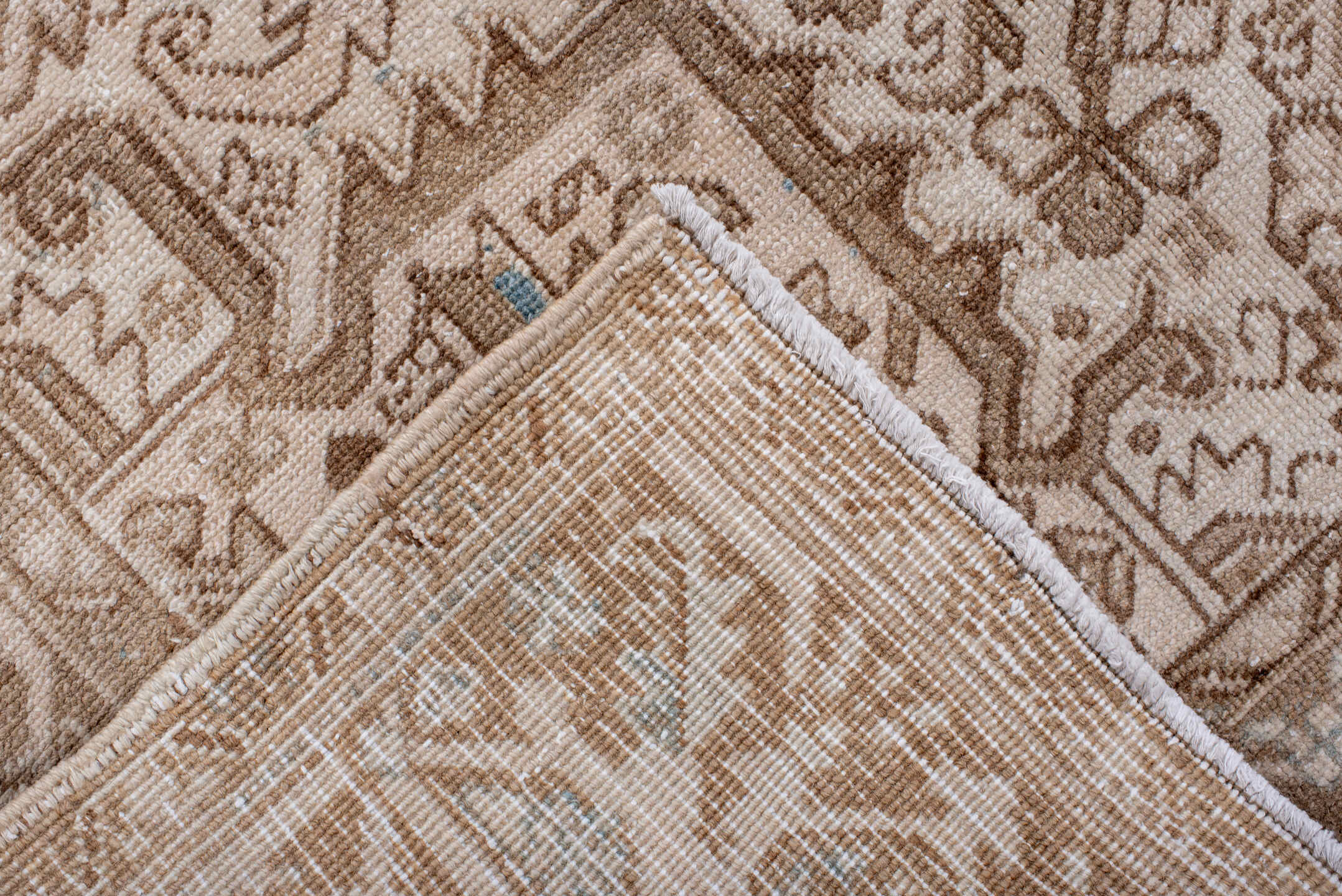 7' x 9' one-of-a-kind handmade antique Heriz rug. Color palette: ivory, camel, taupe, beige, sand, gray