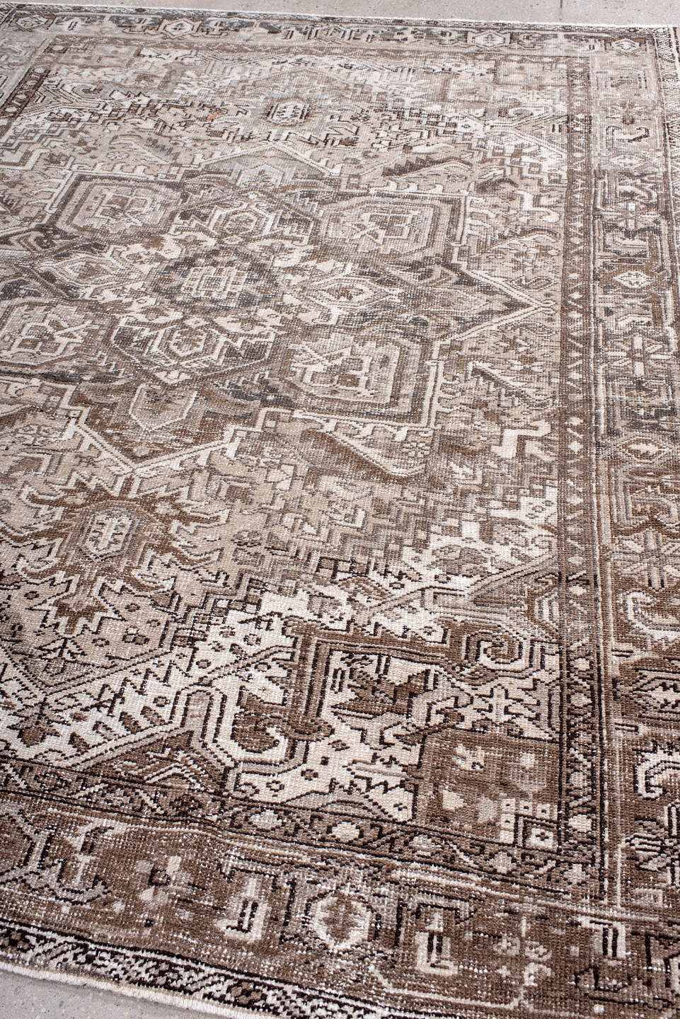 6' x 8' one-of-a-kind handmade antique Heriz medium size rug. Color palette: taupe, ivory, brown, rose, charcoal, beige
