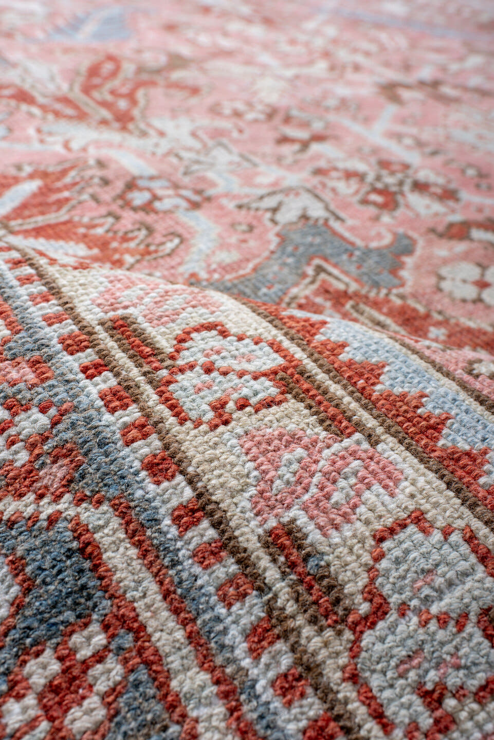 8' x 10' one-of-a-kind handmade antique Heriz large size rug. Color palette: rose, sky blue, ivory, terra cotta, rust, taupe