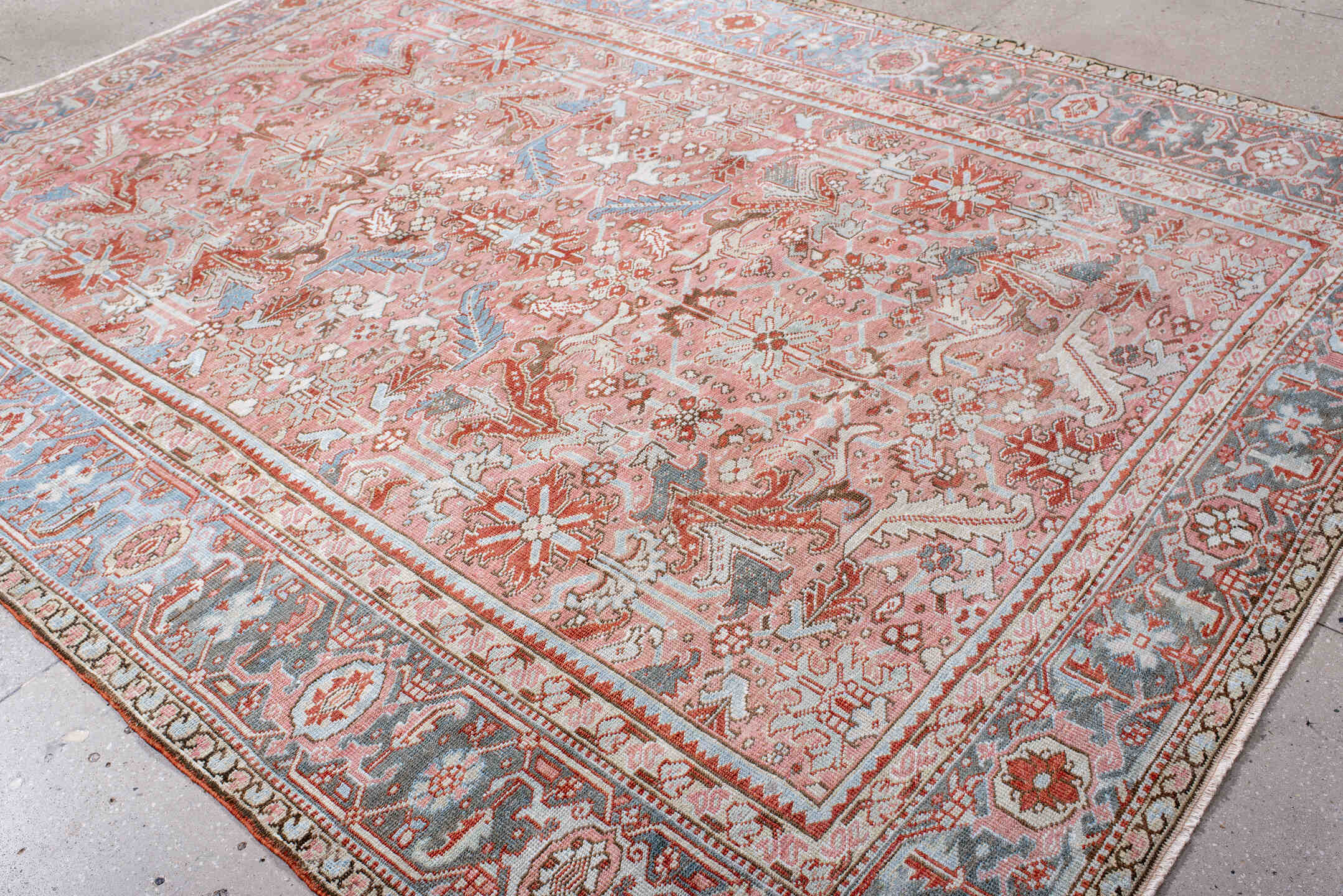 8' x 10' one-of-a-kind handmade antique Heriz large size rug. Color palette: rose, sky blue, ivory, terra cotta, rust, taupe