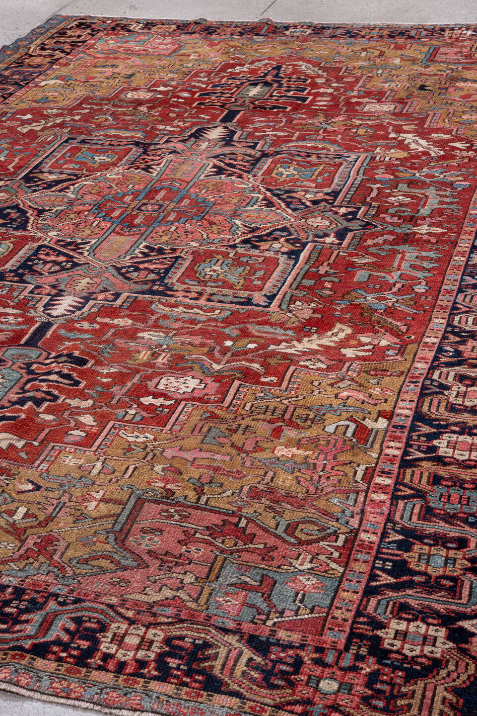 8' x 11' one-of-a-kind handmade vintage Heriz large size rug. Color palette: red, navy, camel, sky_blue, ivory, rose