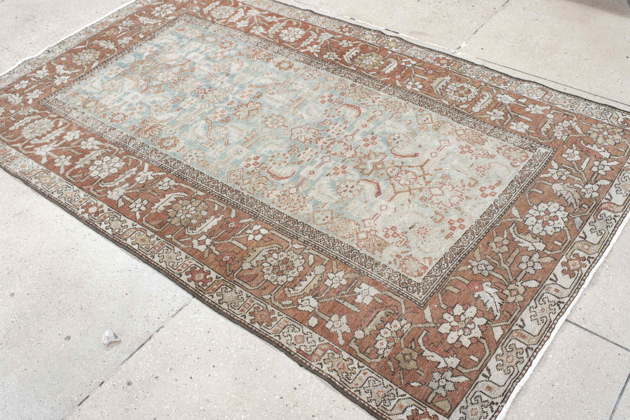 4' x 7' one-of-a-kind handmade vintage Malayer rug. Color palette: ivory, rust, pale blue, taupe, camel, rose, brown