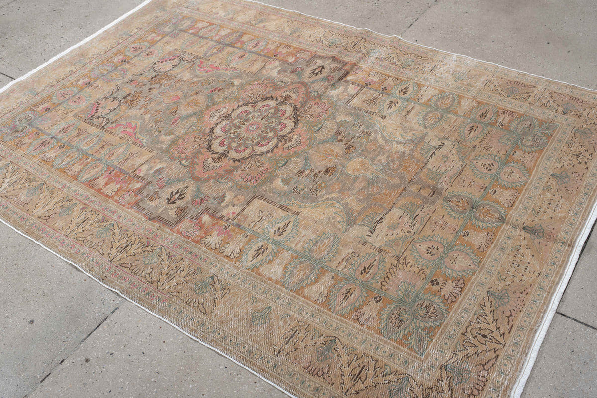 5' x 7' one-of-a-kind handmade antique Hereke rug. Color palette: blush, ivory, celadon, peach, coral, taupe, sage, brown