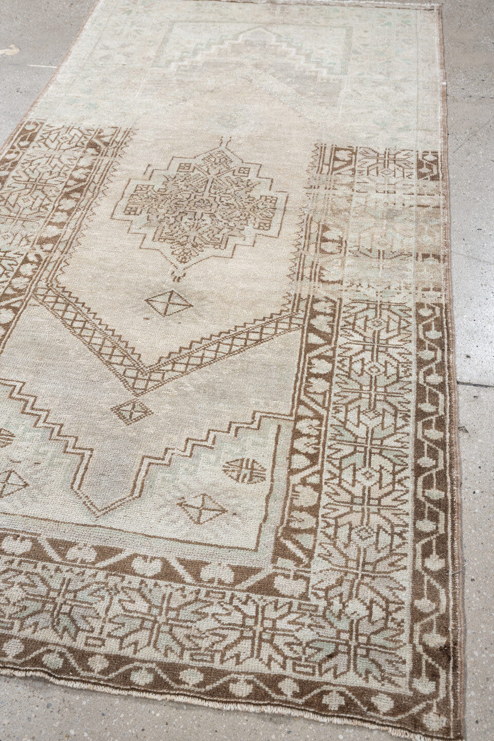 3' x 6' one-of-a-kind handmade antique Anatolian rug. Color palette: ivory, taupe, beige, camel, sand, light brown, gray