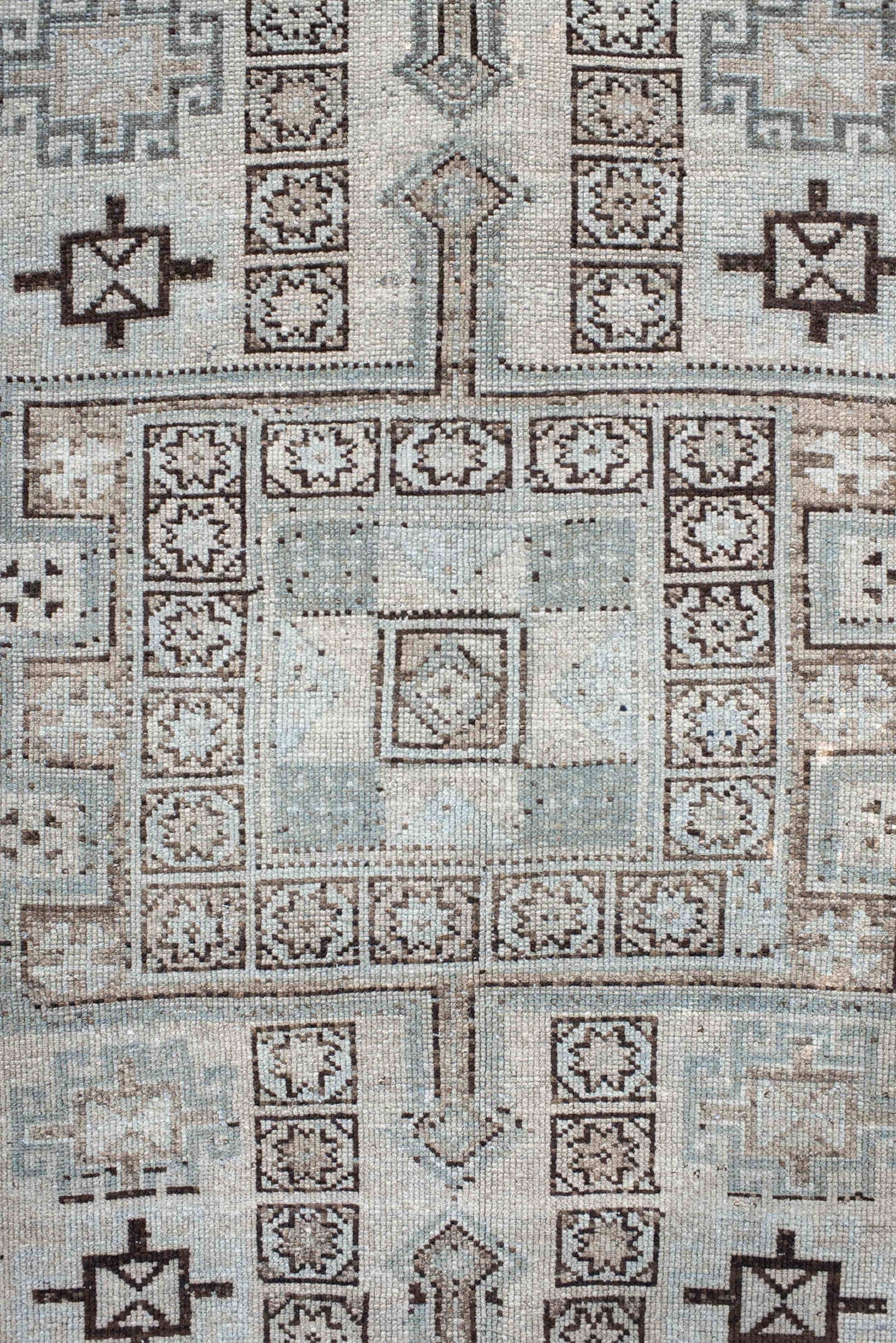 4' x 9' one-of-a-kind handmade antique NW Persian runner rug. Color palette: ivory, taupe, brown, camel, slate, beige, gray