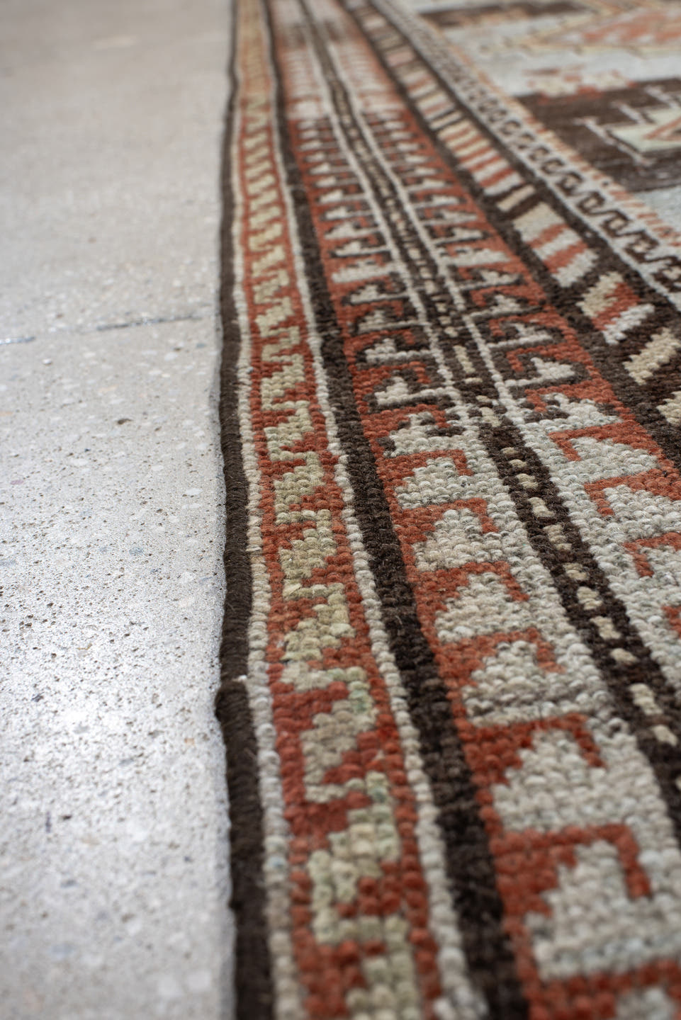 4' x 6' one-of-a-kind handmade vintage Gabbe rug. Color palette: ivory, rust, brown, charcoal, camel, pale blue, terracotta