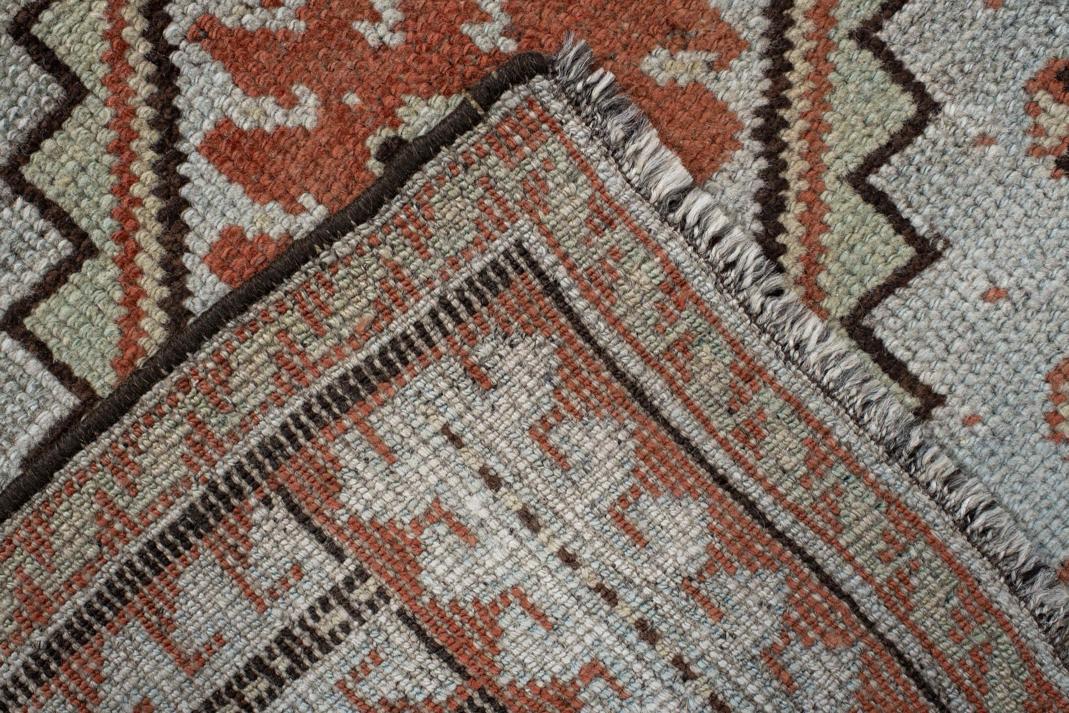 4' x 6' one-of-a-kind handmade vintage Gabbe rug. Color palette: ivory, rust, brown, charcoal, camel, pale blue, terracotta