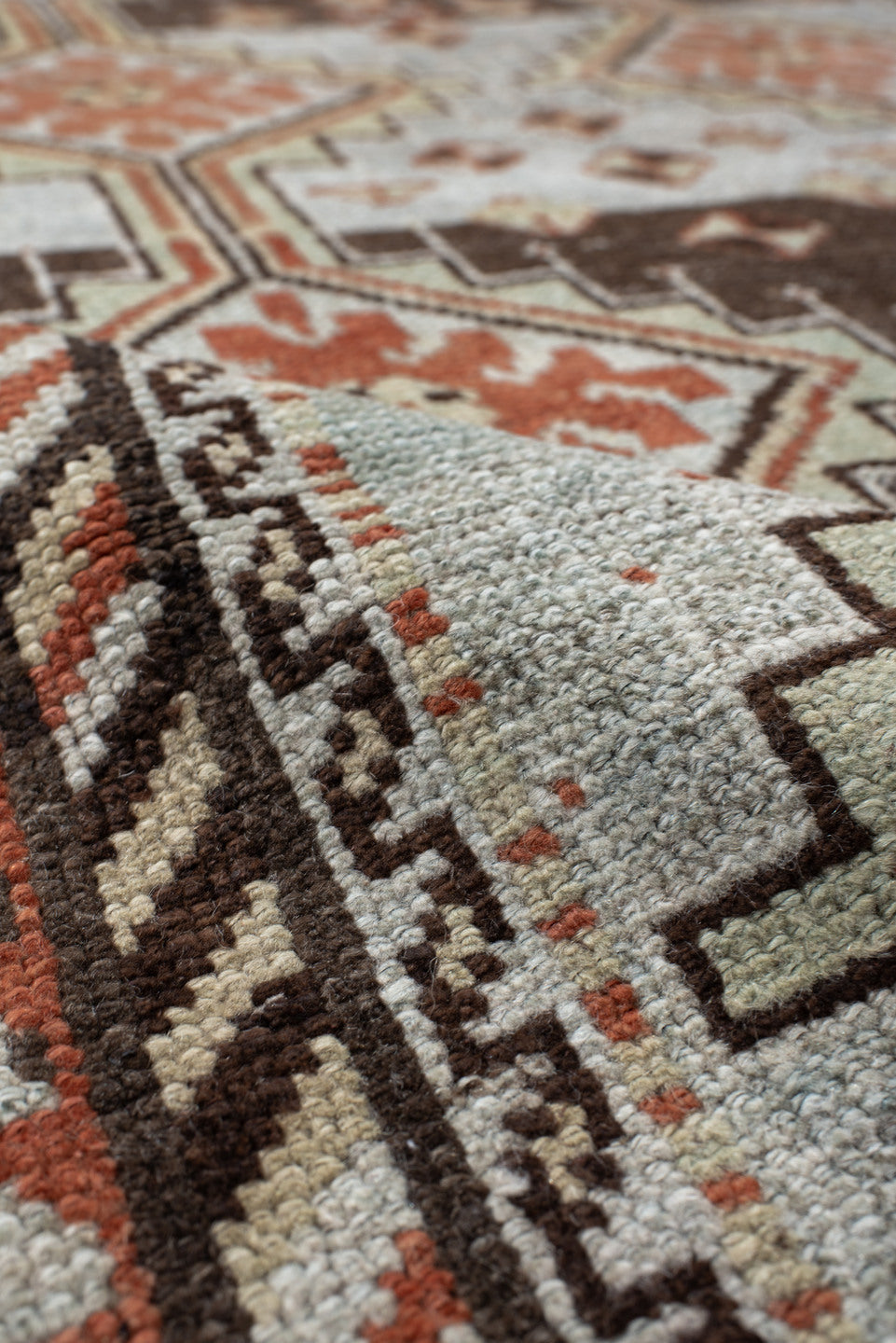 4' x 6' one-of-a-kind handmade vintage Gabbe rug. Color palette: ivory, rust, brown, charcoal, camel, pale blue, terracotta