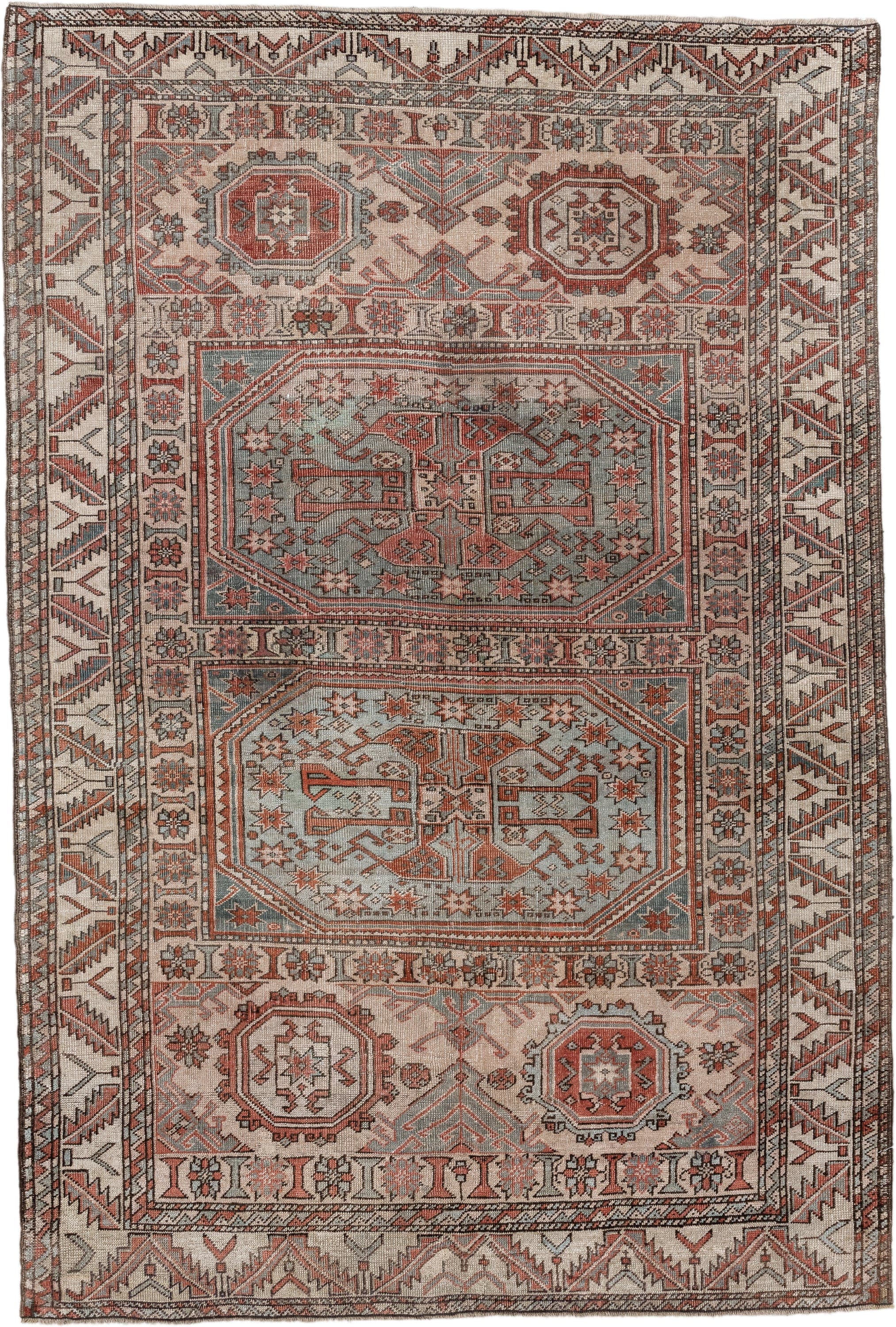 5' x 7' one-of-a-kind handmade antique Anatolian rug. Color palette: ivory, rust, blue_gray, charcoal, terracotta, taupe