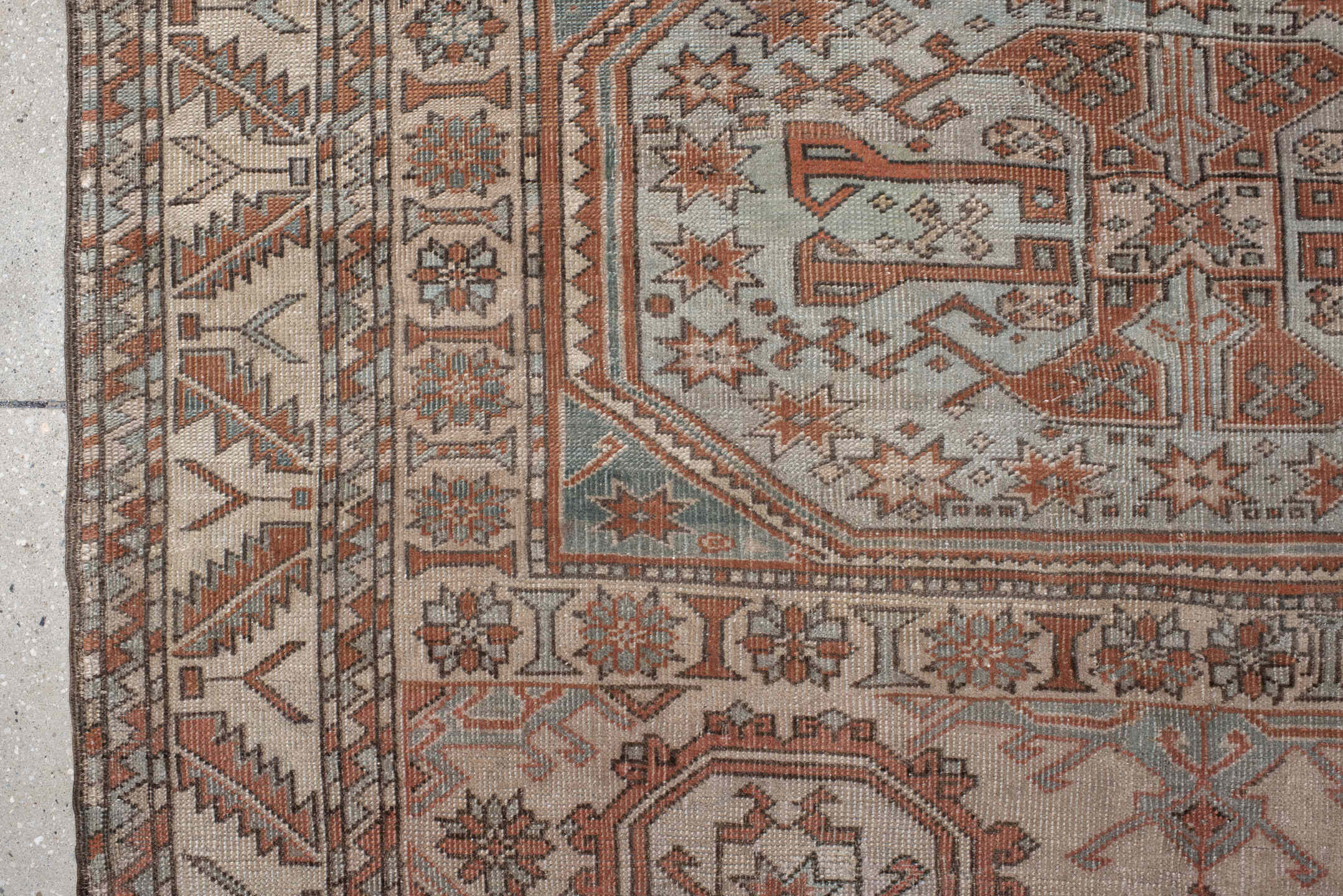 5' x 7' one-of-a-kind handmade antique Anatolian rug. Color palette: ivory, rust, blue_gray, charcoal, terracotta, taupe