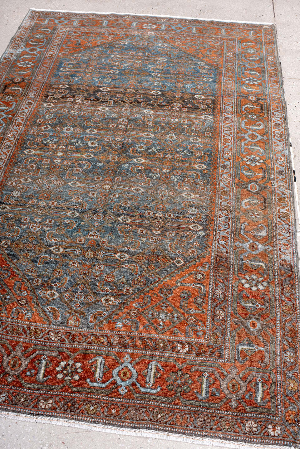 4' x 7' one-of-a-kind handmade antique Malayer rug. Color palette: rust, blue, ivory, slate, charcoal, taupe, camel