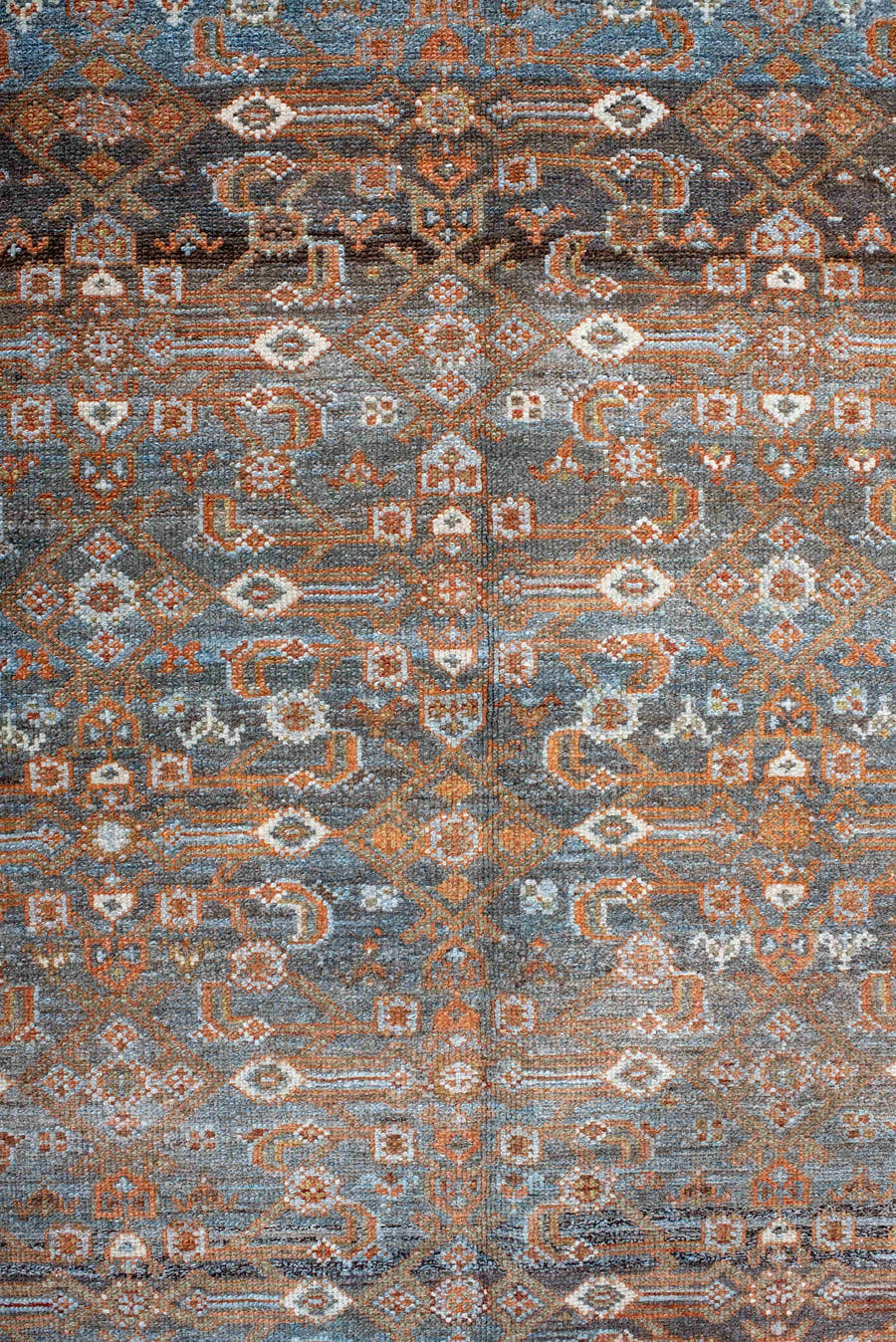 4' x 7' one-of-a-kind handmade antique Malayer rug. Color palette: rust, blue, ivory, slate, charcoal, taupe, camel