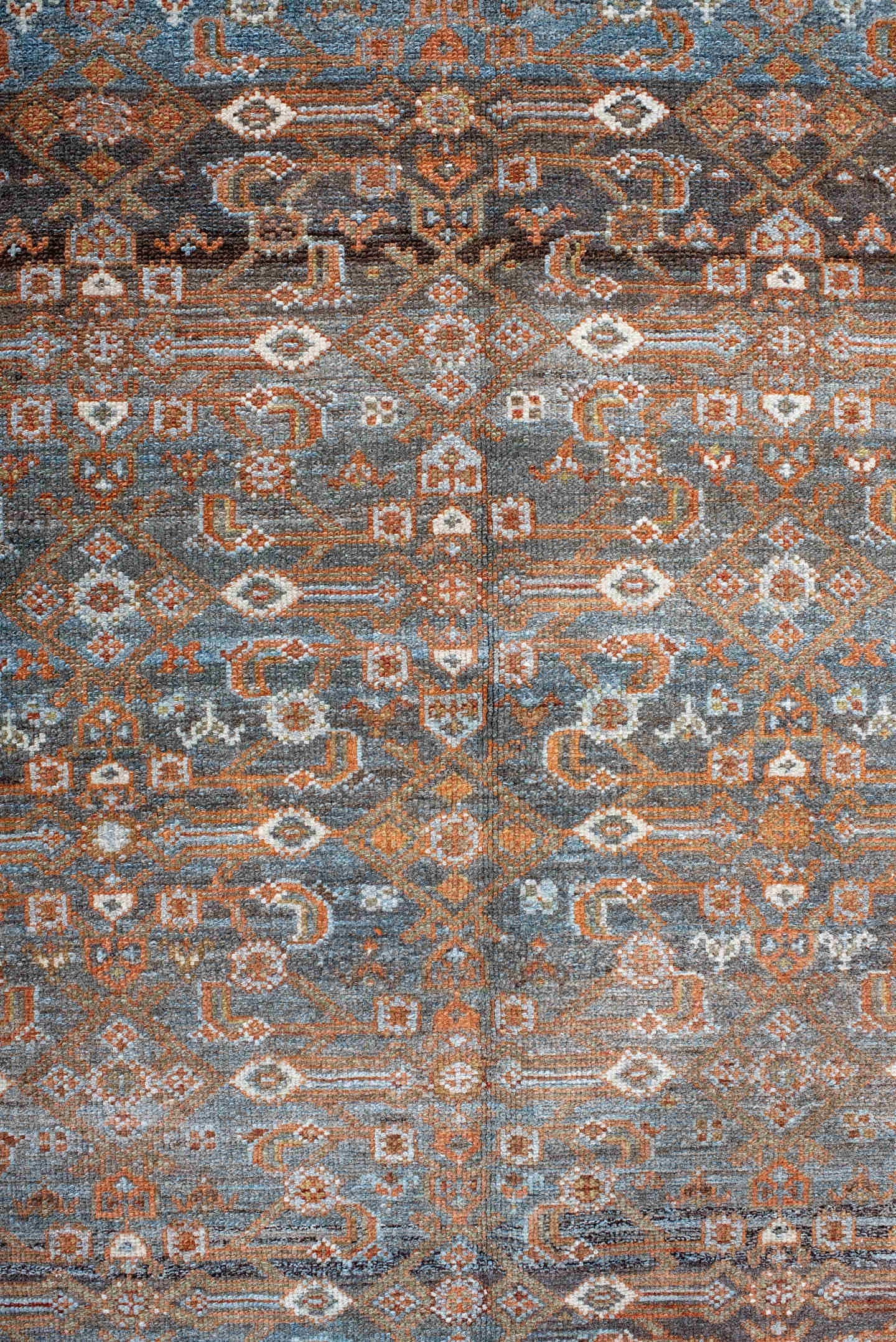 4' x 7' one-of-a-kind handmade antique Malayer rug. Color palette: rust, blue, ivory, slate, charcoal, taupe, camel