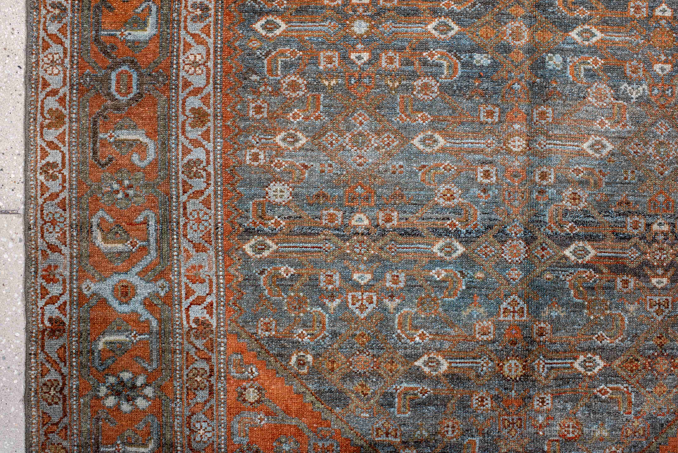 4' x 7' one-of-a-kind handmade antique Malayer rug. Color palette: rust, blue, ivory, slate, charcoal, taupe, camel