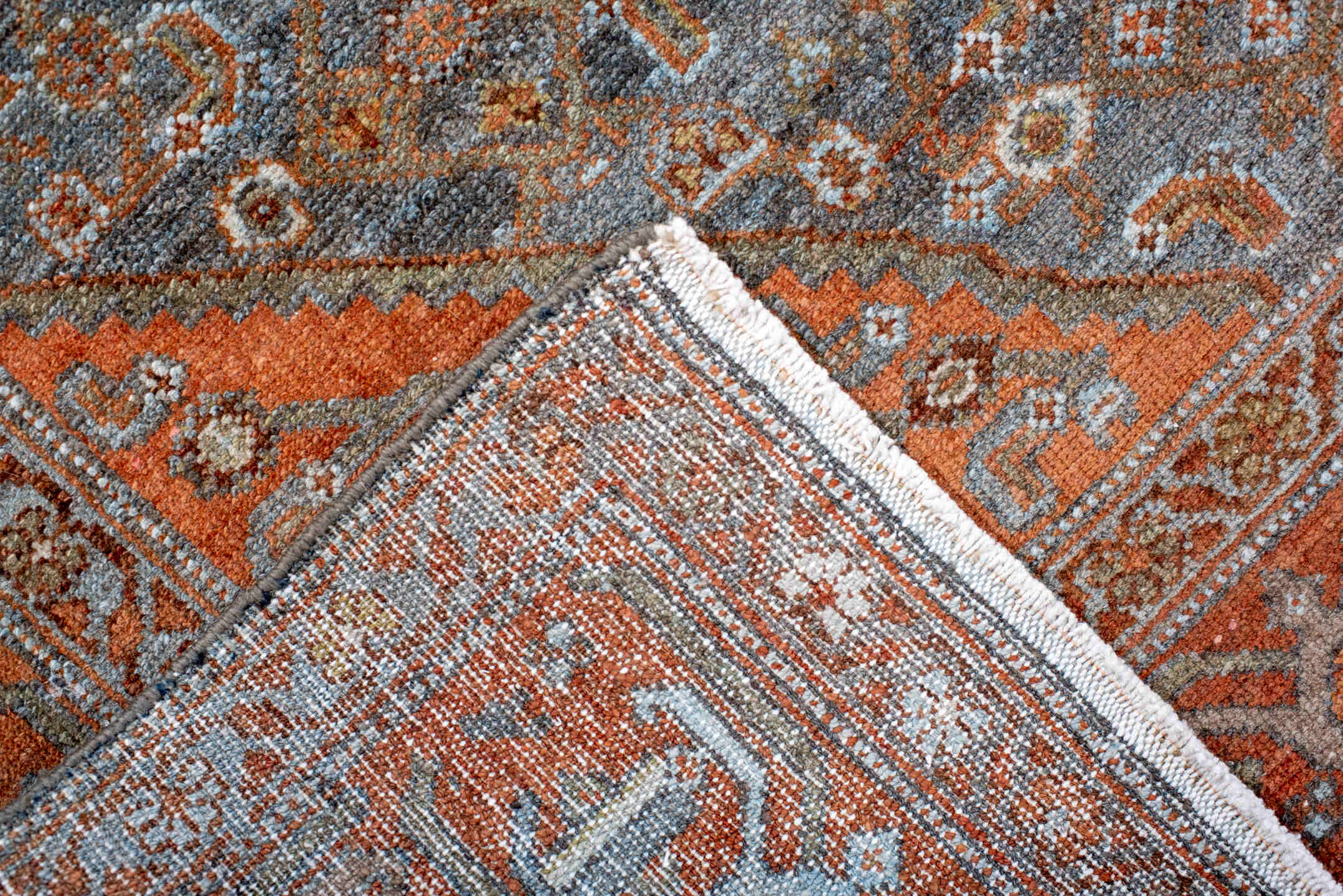 4' x 7' one-of-a-kind handmade antique Malayer rug. Color palette: rust, blue, ivory, slate, charcoal, taupe, camel