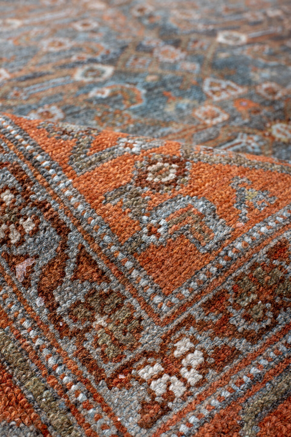 4' x 7' one-of-a-kind handmade antique Malayer rug. Color palette: rust, blue, ivory, slate, charcoal, taupe, camel