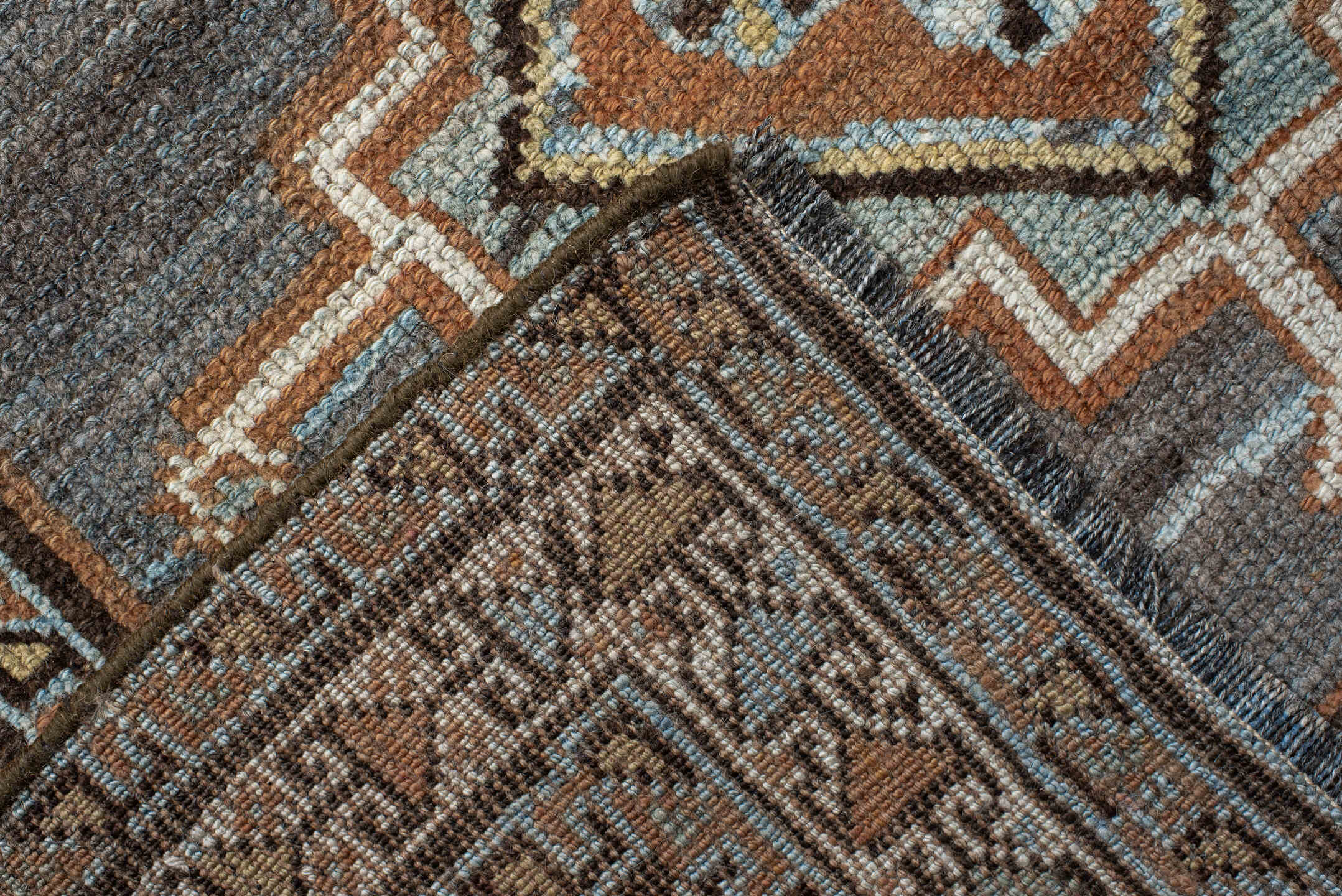 3' x 7' one-of-a-kind handmade antique Gabbe rug. Color palette: blue, rust, ivory, brown, camel, teal, charcoal, terracotta
