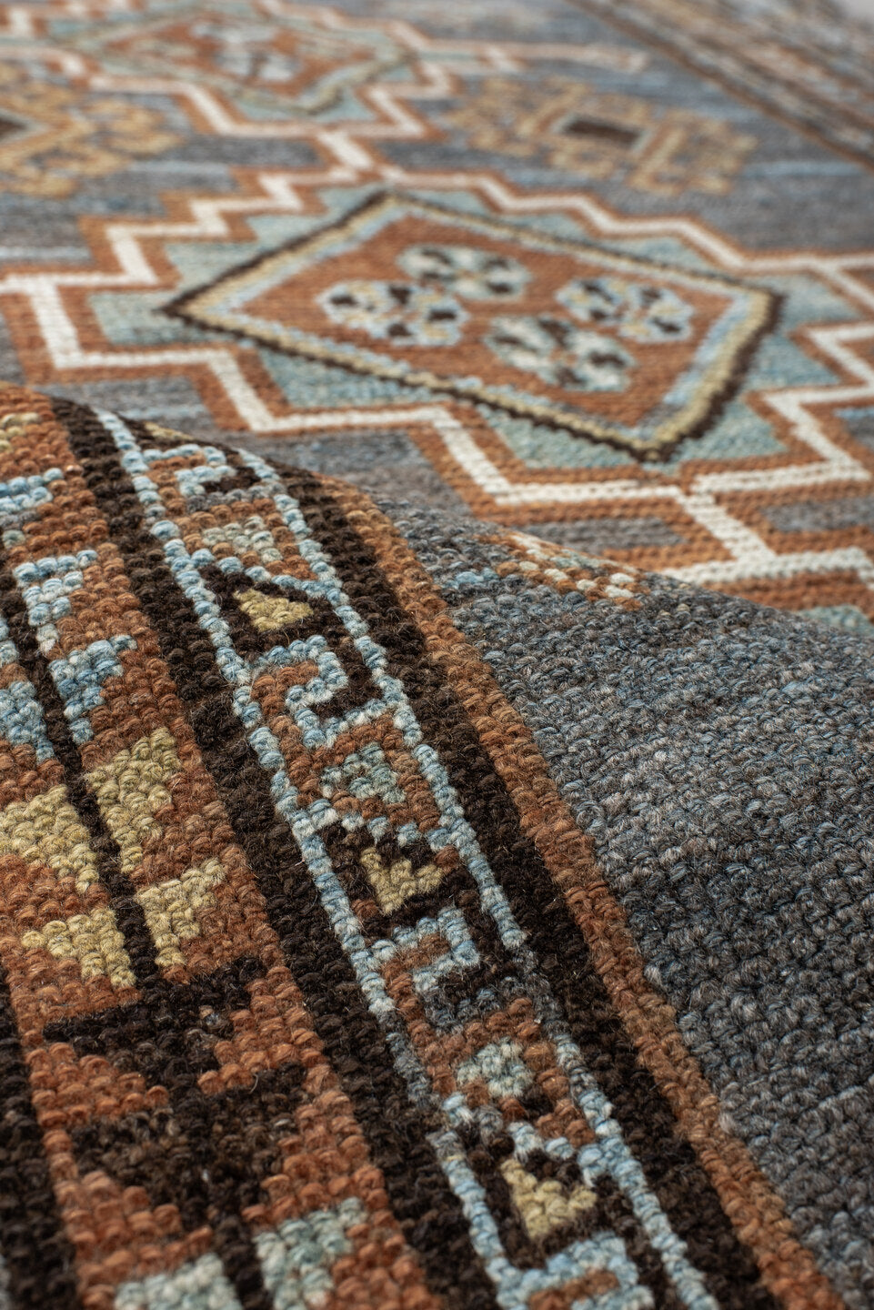 3' x 7' one-of-a-kind handmade antique Gabbe rug. Color palette: blue, rust, ivory, brown, camel, teal, charcoal, terracotta