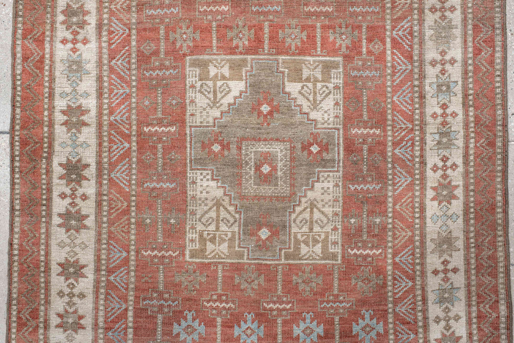 3' x 7' one-of-a-kind handmade antique Belouch runner rug. Color palette: terra cotta, ivory, taupe, brown, slate, rust